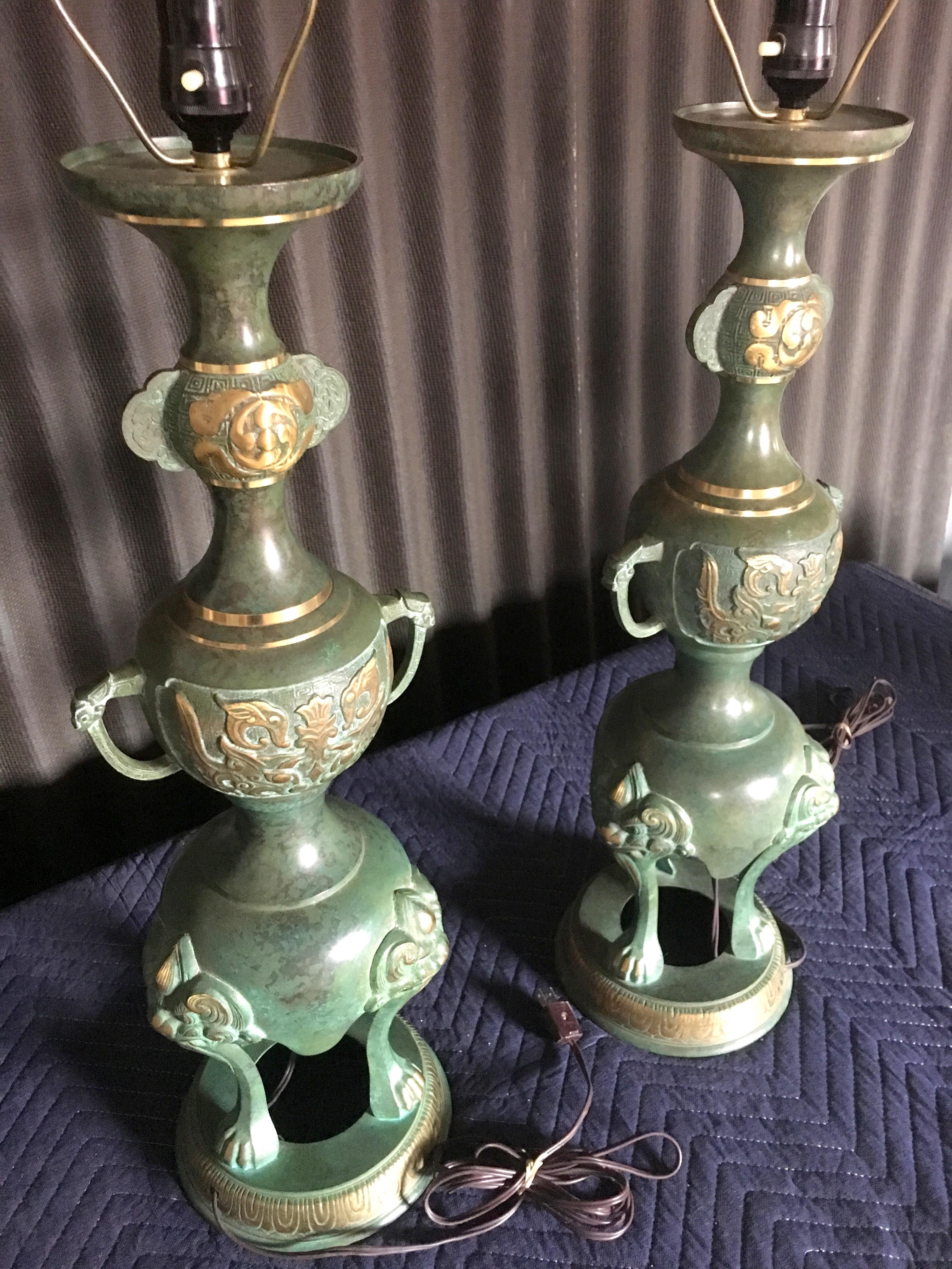 Bronze Dramatic Pair of James Mont Style Asian Lamps For Sale