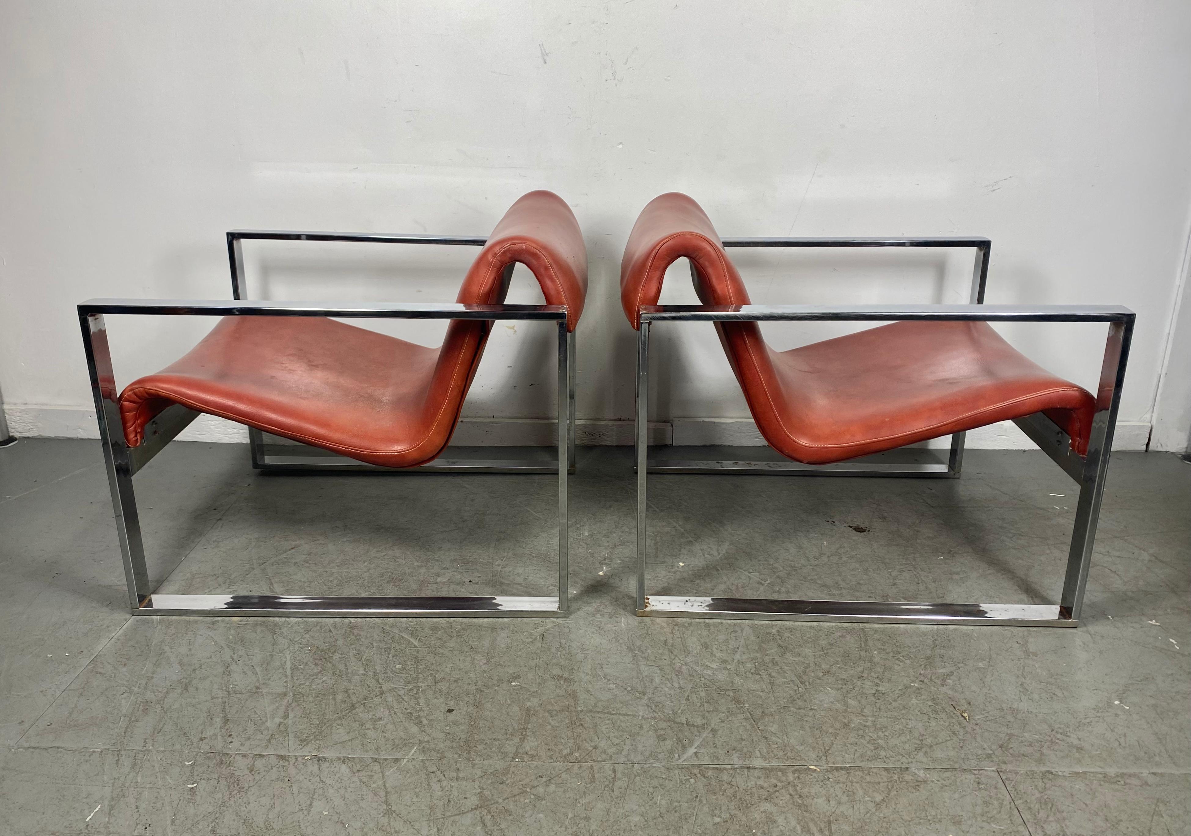 Dramatic pair stylized chrome frame lounge chairs, after Milo Baughman. Thayer Coggin. Stunning color. Great original condition. Extremely comfortable. Hand delivery avail to New York City or anywhere en route from Buffalo NY.