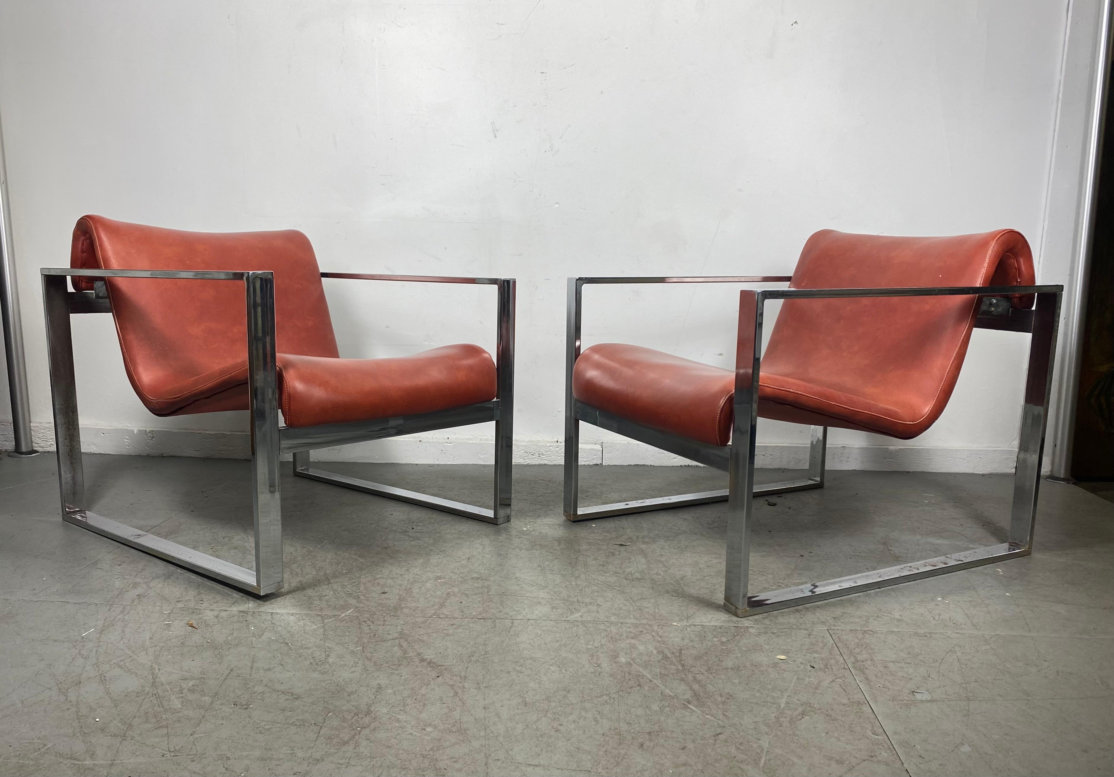 Late 20th Century Dramatic Pair Stylized Chrome Frame Lounge Chairs, After Milo Baughman