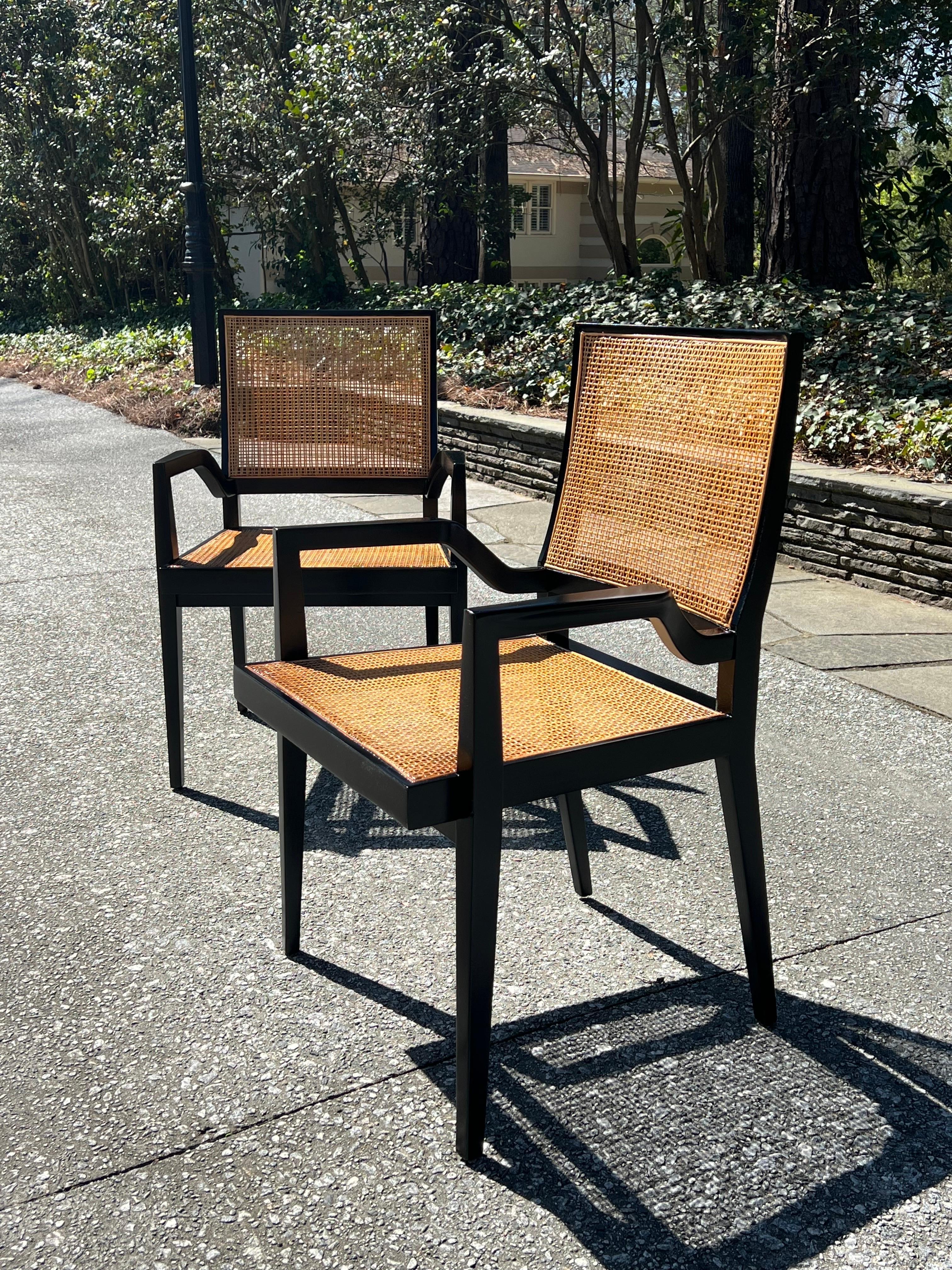Dramatic Set of 20 Sophisticated Black Lacquer Cane Arm Chairs by Michael Taylor In Excellent Condition For Sale In Atlanta, GA