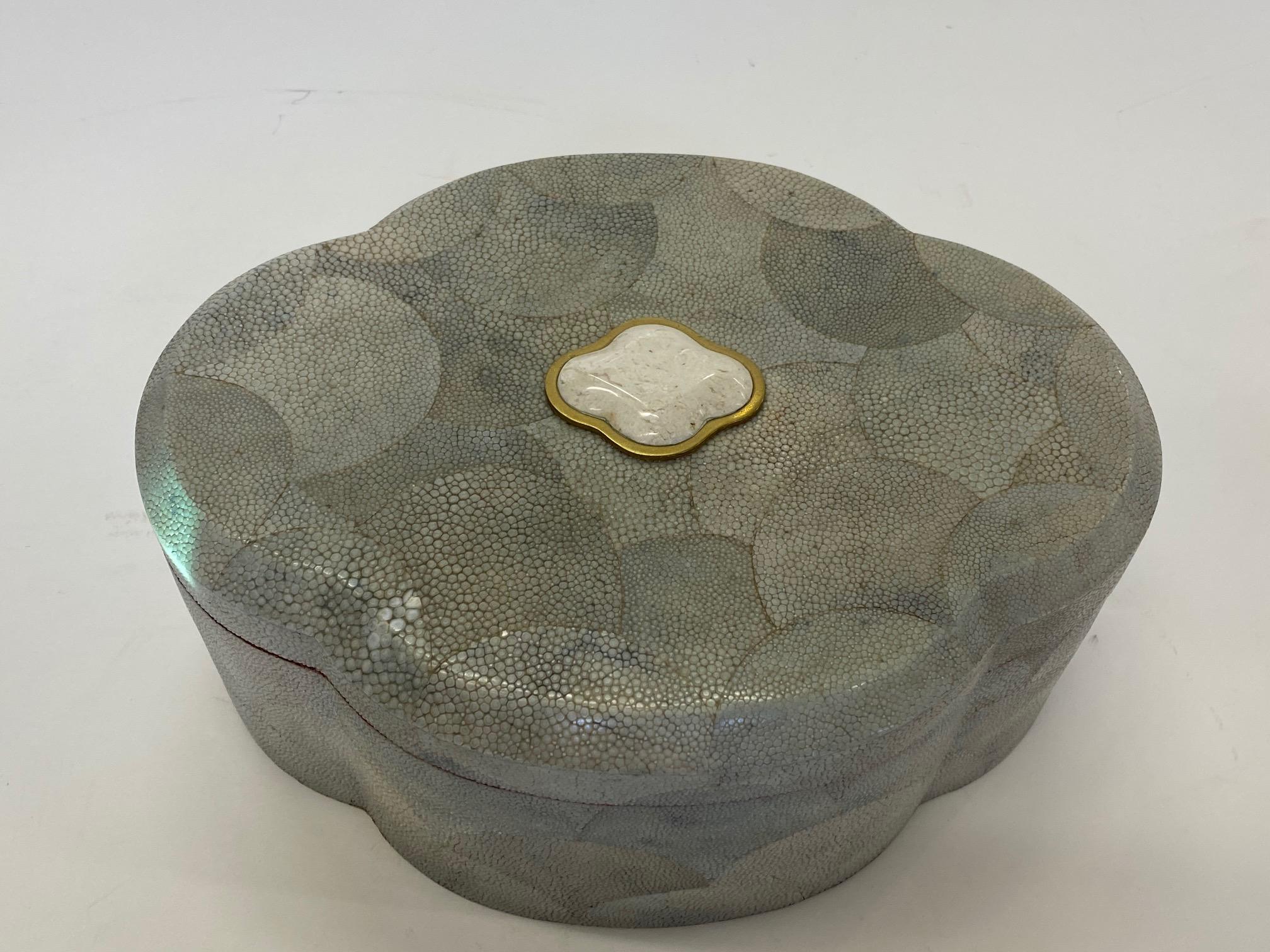 A generously sized beautifully crafted scalloped shaped shagreen lidded box having wooden interior and lovely bone decoration on top.