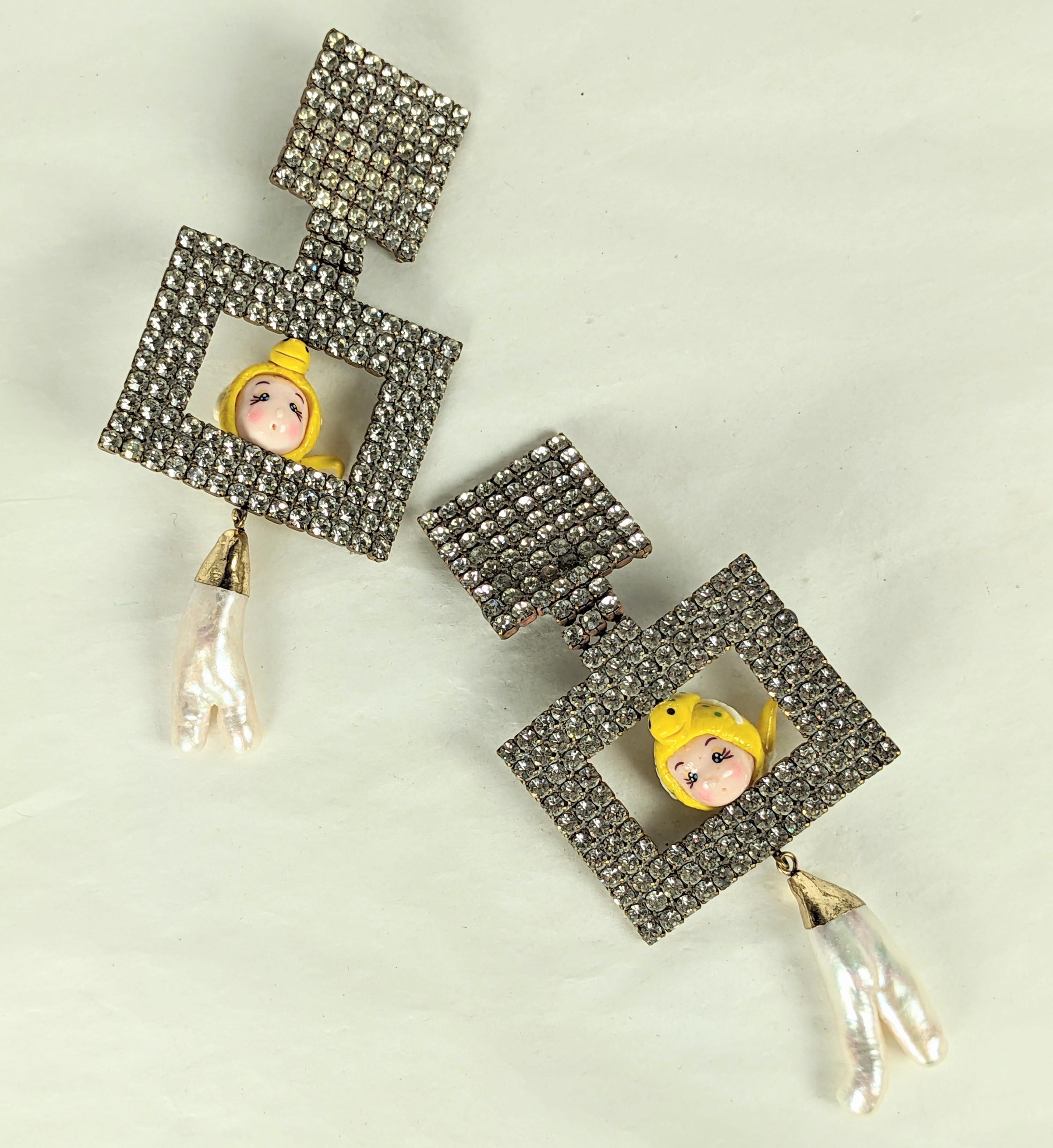 Dramatic and Unusual Upcycled Earrings by Studio VL, composed of vintage rhinestone earrings with the addition of framed anime character beads and baroque freshwater pearl drops. Oversized scale, 2000's USA. 4.5