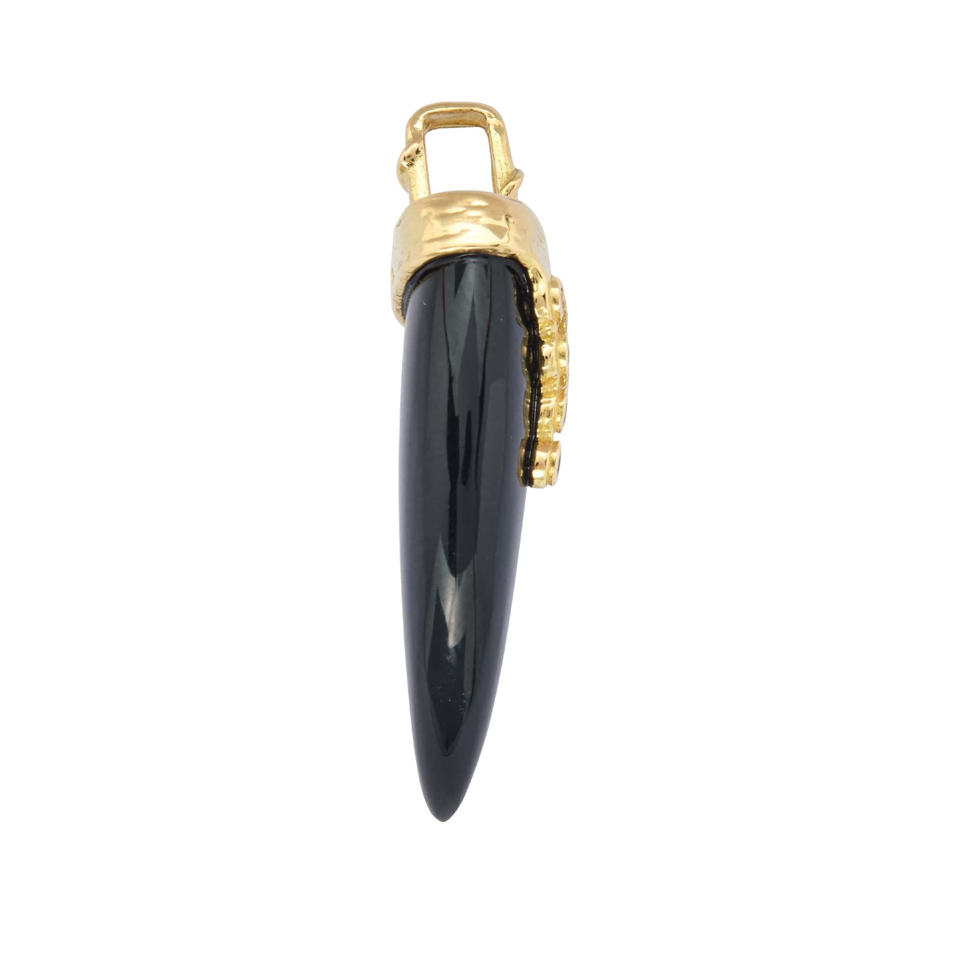 This amulet designed to attract good luck and prosperity is one of our most enduring and sought-after pendant charms. A weathered 14k yellow gold cap has 5 colorless and 2 black diamonds bezel-set to gracefully drip down the front of a carved black