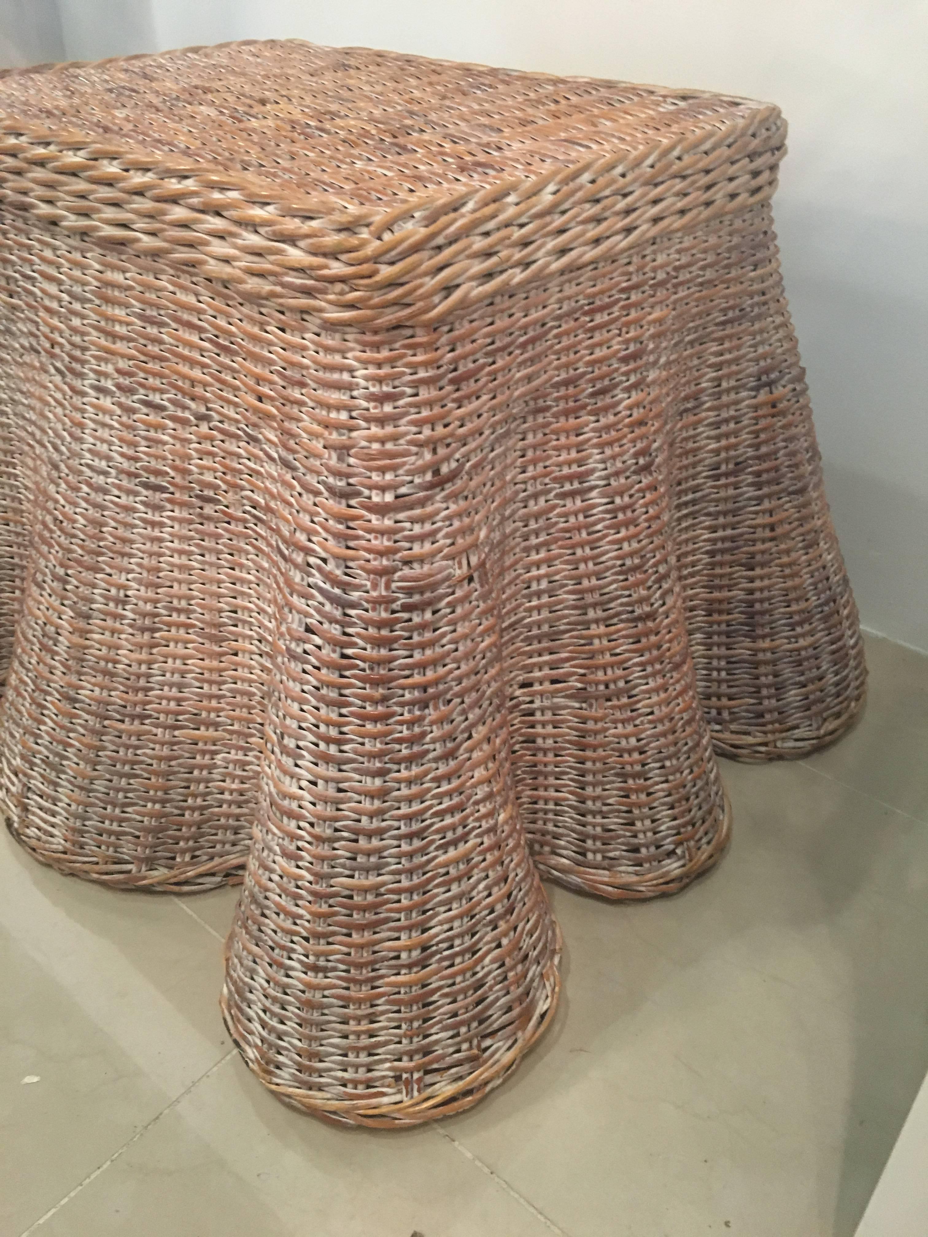 Vintage draped wicker table. This can be used as an end or side table or coffee, cocktail table. Please see dimensions to see which works for your space. I do have two more of these in different variations of wicker color. If you plan on having