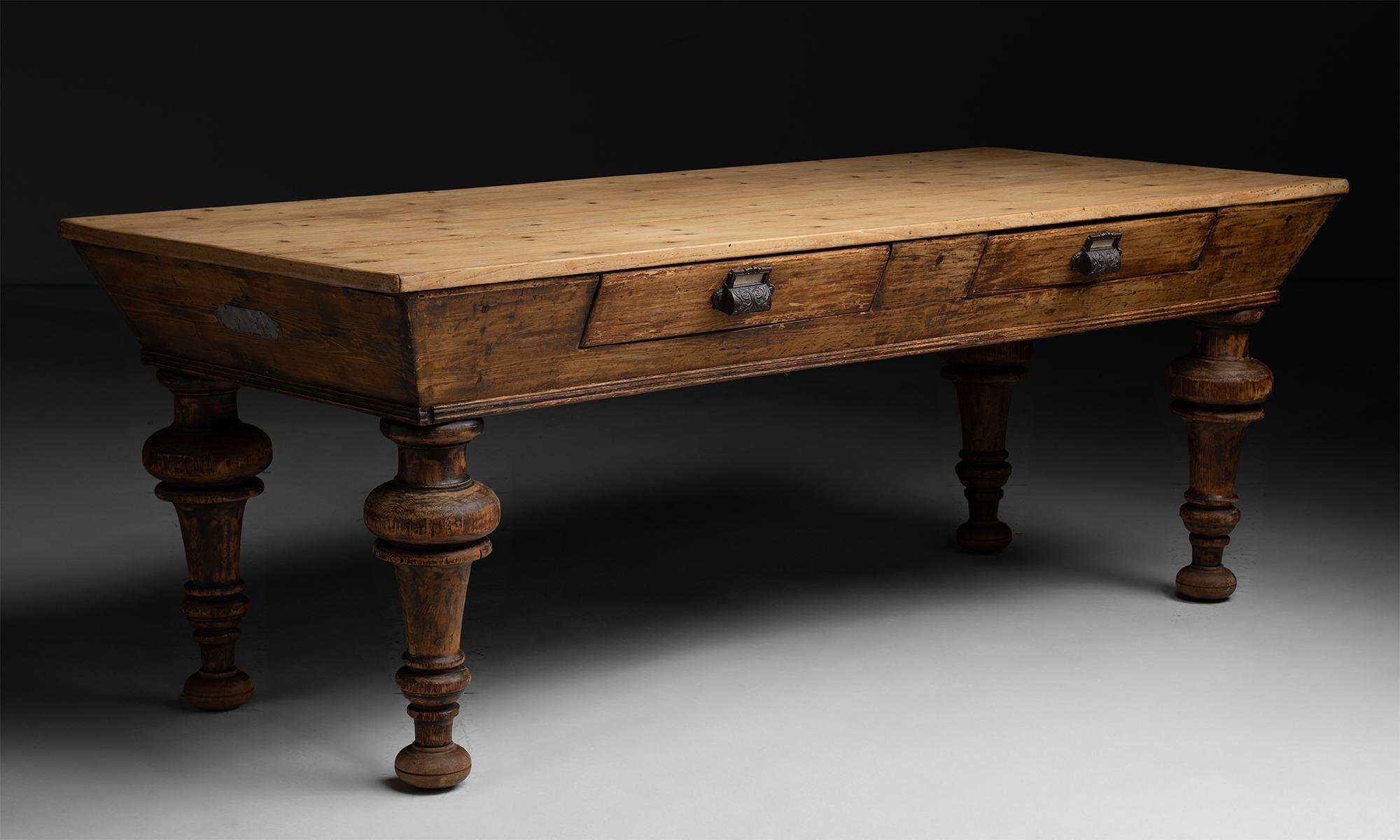 Draper’s Table

France circa 1860

Constructed in pine, angled surface with two drawers and intricate brass pulls.

88.75”L x 37.75”d x 32.75”h ( table )