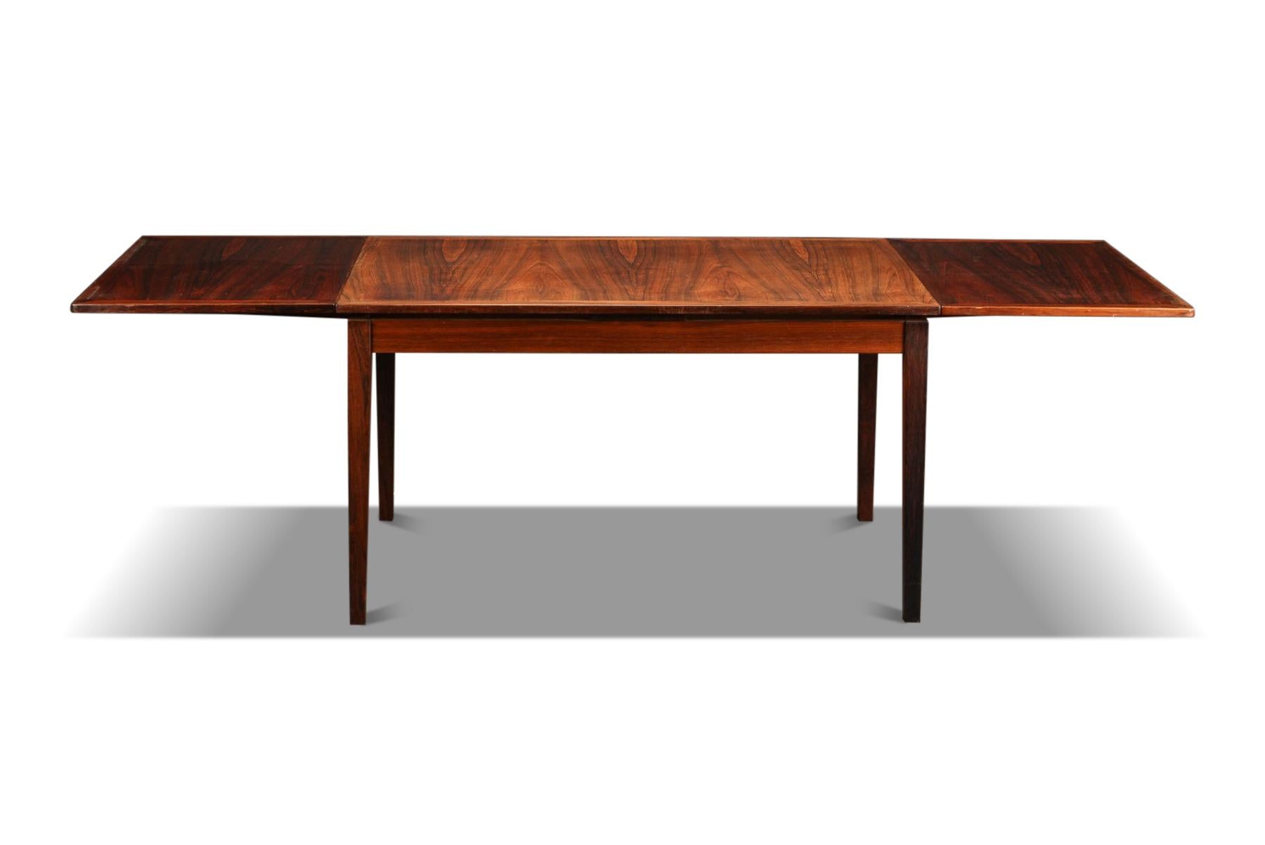 Mid-Century Modern Draw Leaf Brazilian Rosewood Dining Table by Kai Winding For Sale