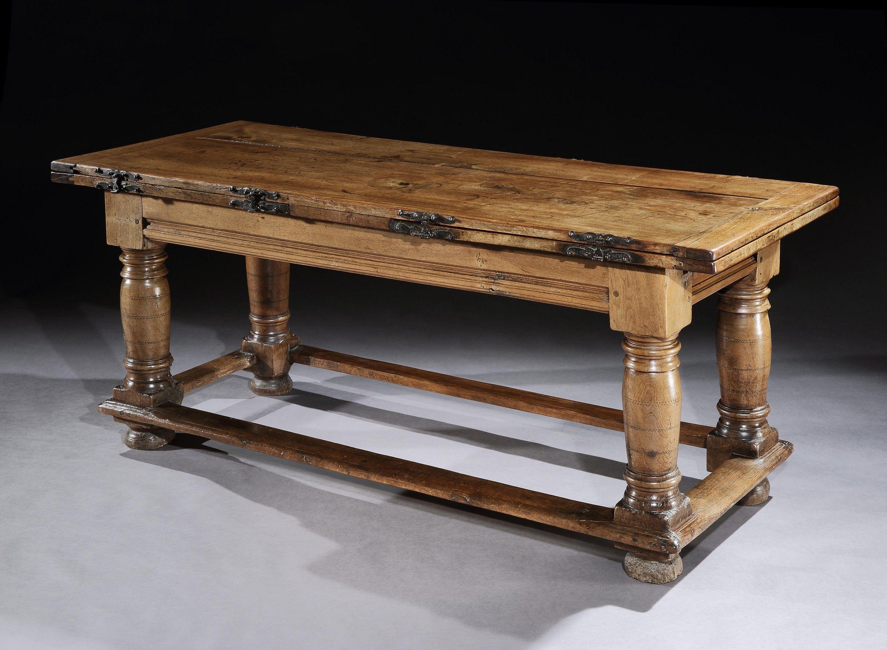 This massive 18-seat table has many features which are typical of drawleaf tables that were made in the last quarter of the 16th century. Early continental drawleaf tables rarely come onto the open market and the massive extended length, original