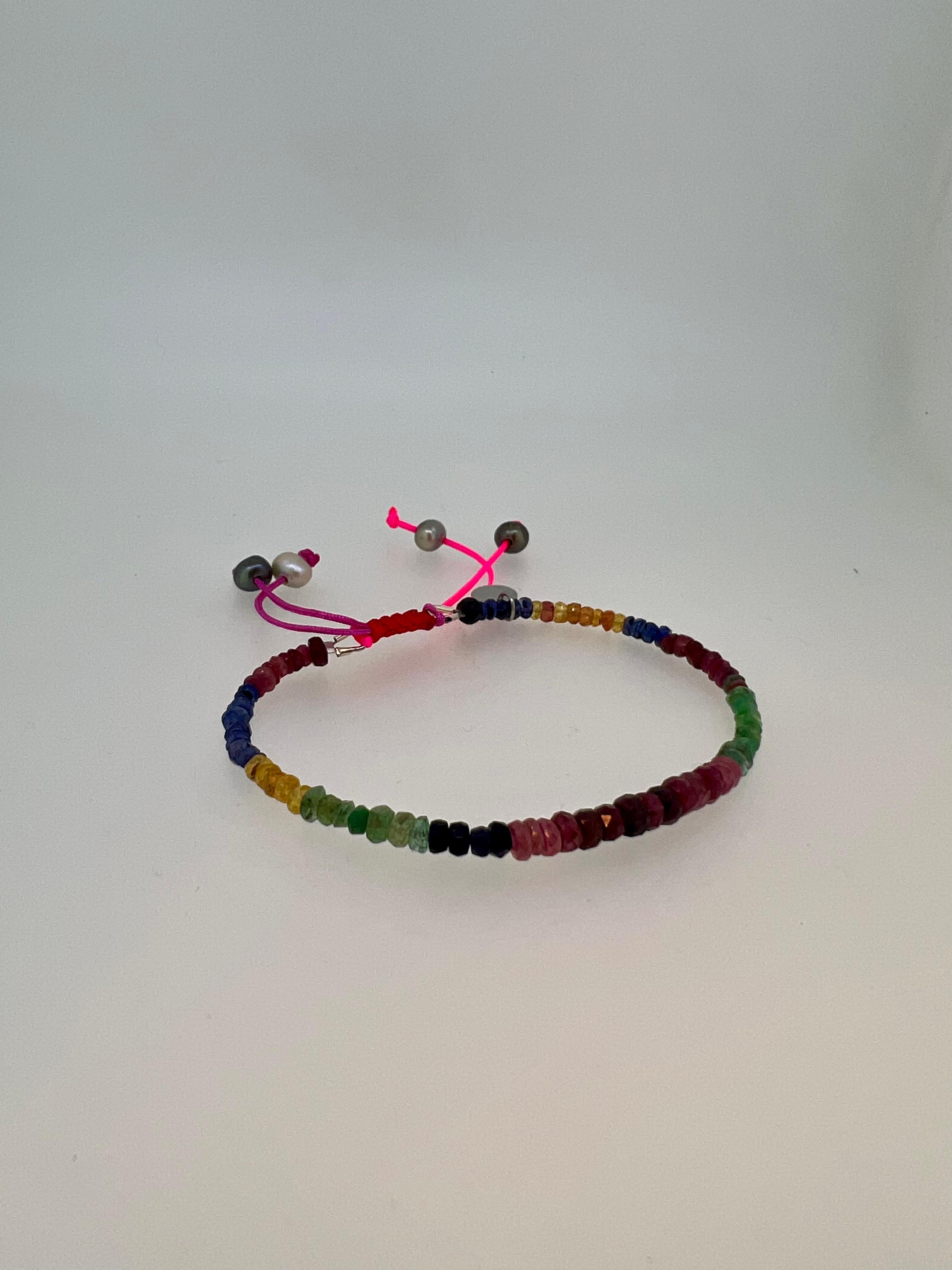 Introducing our Rainbow Gemstone Bracelet, a stunning fusion of color and energy. Made with slightly opaque beads of ruby, emerald, and sapphire, each gemstone brings its unique attributes: ruby for passion, emerald for balance, and sapphire for