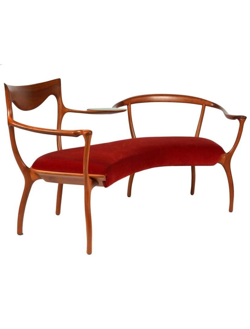 Whimsical D.R.D.P. two seater designed by Roberto Lazzaroni for Ceccotti. Two seater in solid American walnut, seat upholstered in velvet, tray with silver finished sandblasted glass top.
Marked in the bottom . Very little wear by age.