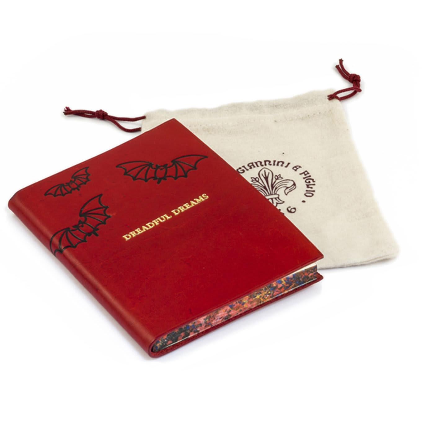 Work out the meanings of your nightmares by recording them in this fanciful dream journal. Its soft, naturally tanned, full-grain leather cover features a whimsical bat motif and the words Dreadful Dreams in gold. Contains blank, acid-free,