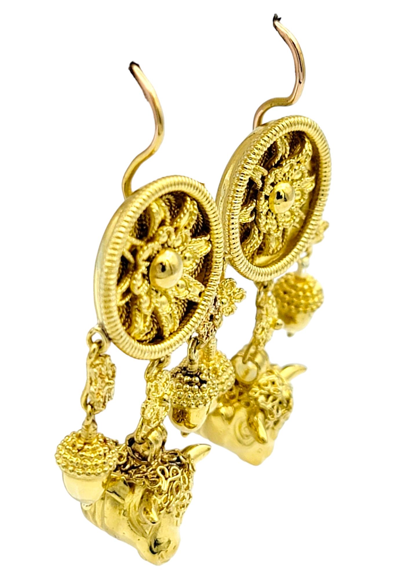 Contemporary Dream Catcher Motif with Cow Head Dangle Earrings Set in 22 Karat Yellow Gold For Sale