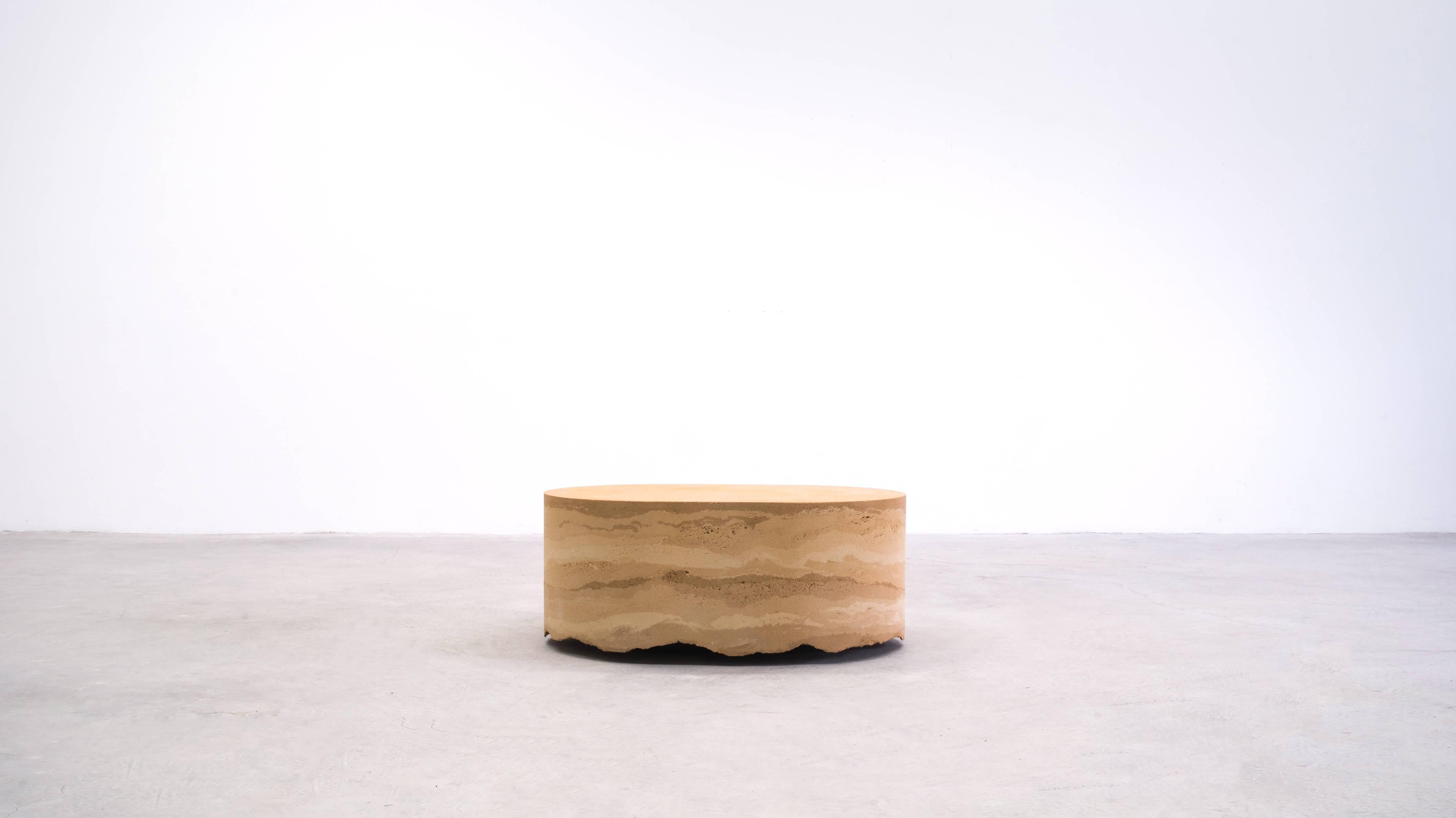 Composed in a language of landscape-oriented abstraction, the made-to-order coffee table is cast entirely from hand-dyed sand. The hand-dyed layers are stratified with delicate veins and ombre effects to create an organic piece to emulate a desert