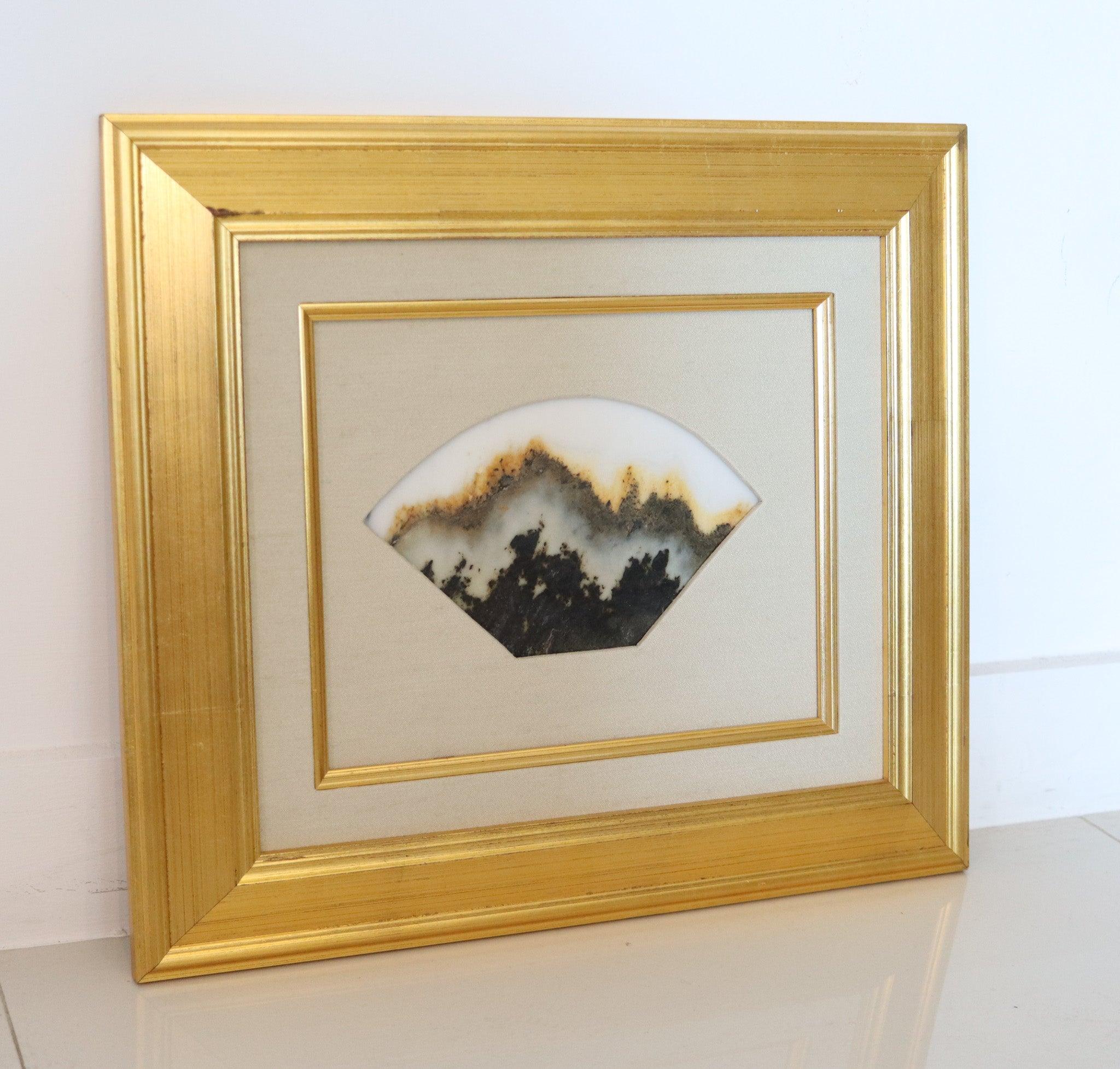 Framed Shih-Hua dream stone landscape.

This is a gorgeous framed and matted marble stone slice known as a dream stone Shih-Hua boasting swirling hues of butterscotch, charcoal, light grey, black, and pearly white. Dream stones, such as this