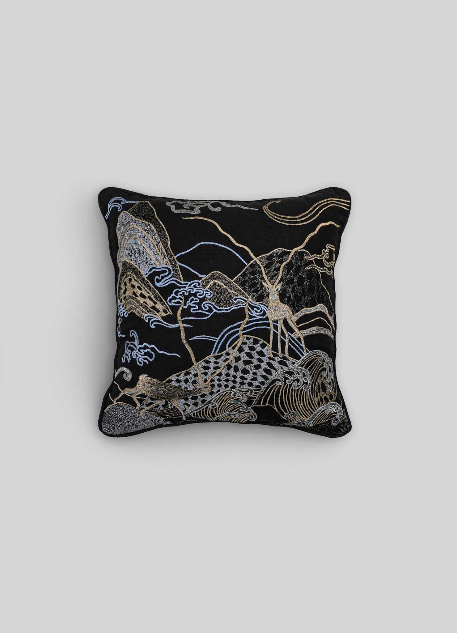Dreamscape Blackbuck Black & Gold Embroidered Linen Cushion Small, Viya By Vikram Goyal

Behold the tangible embodiment of a reverie – a whimsical collection of textiles inspired by the 17th-century Rajput manuscript, 