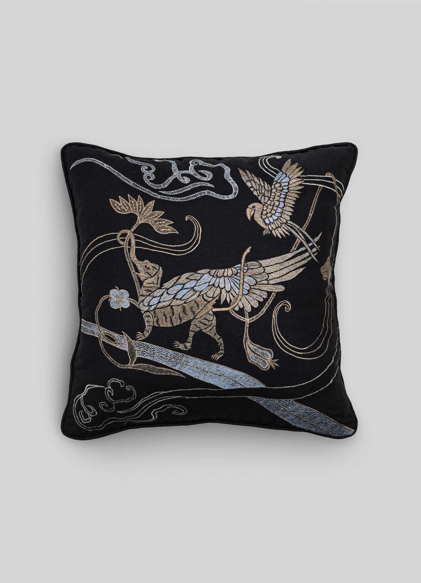 Dreamscape Leophant Black & Gold Embroidered Linen Cushion, Viya By Vikram Goyal

Behold the tangible embodiment of a reverie – a whimsical collection of textiles inspired by the 17th-century Rajput manuscript, 