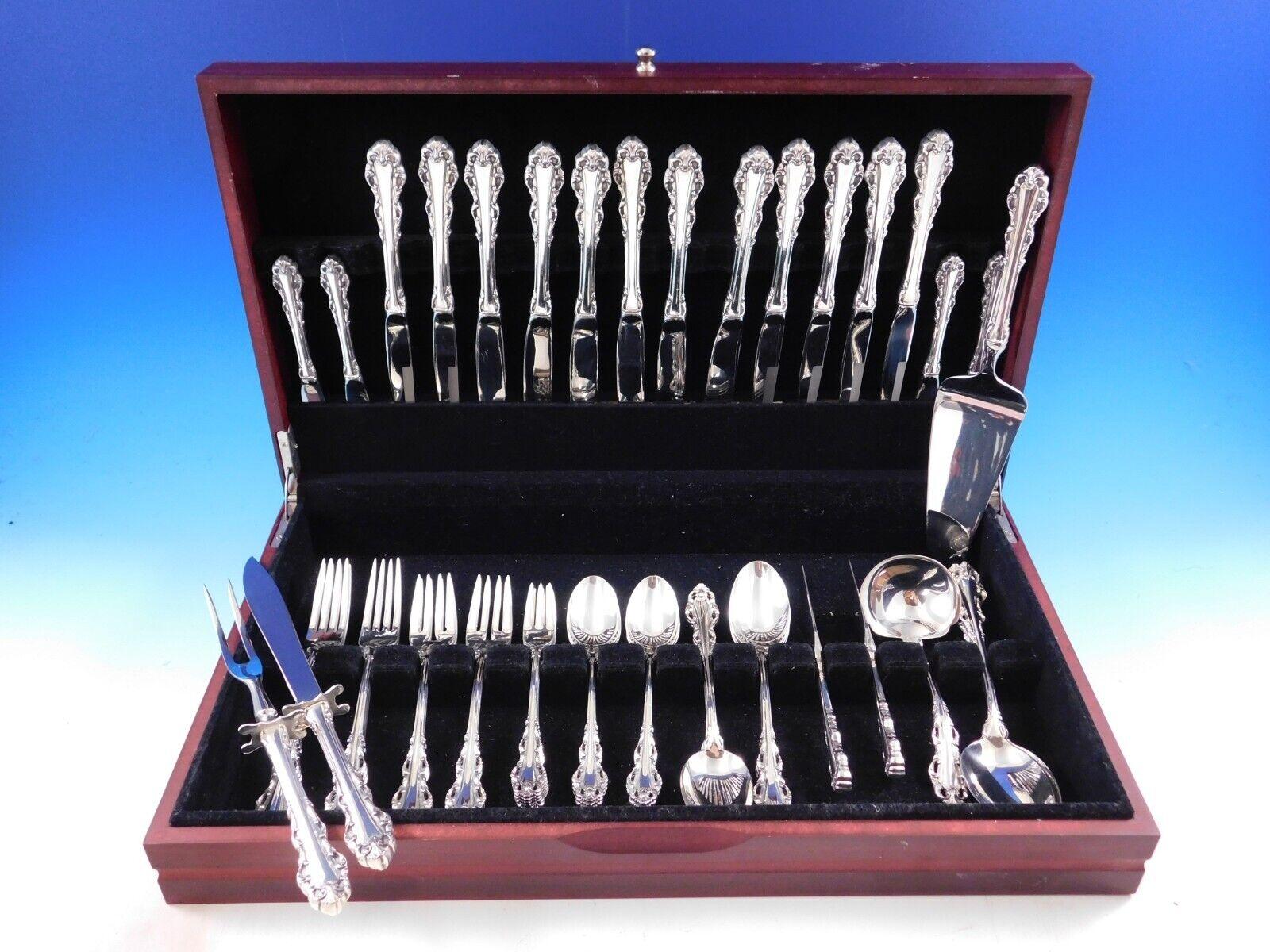 Dresden Scroll by Lunt sterling silver Flatware set, 54 pieces. This set includes:

6 Knives, 9
