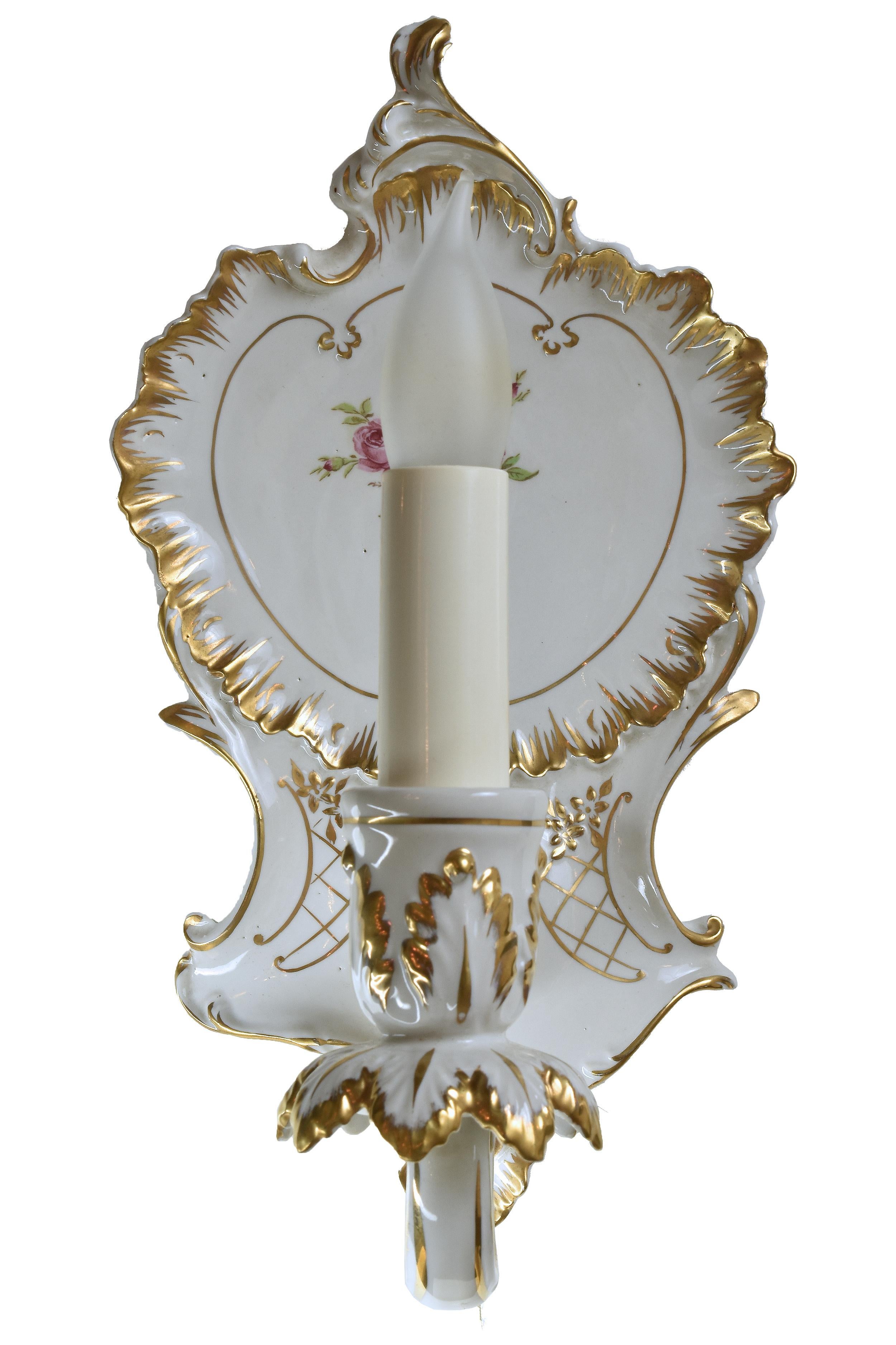 Sold as pair only

These Dresden style sconces are as rare as they are beautiful. Manufactured in the early 1900s, these porcelain light fixtures will make extravagant additions to any room. The interior products associated with Dresden, Germany,