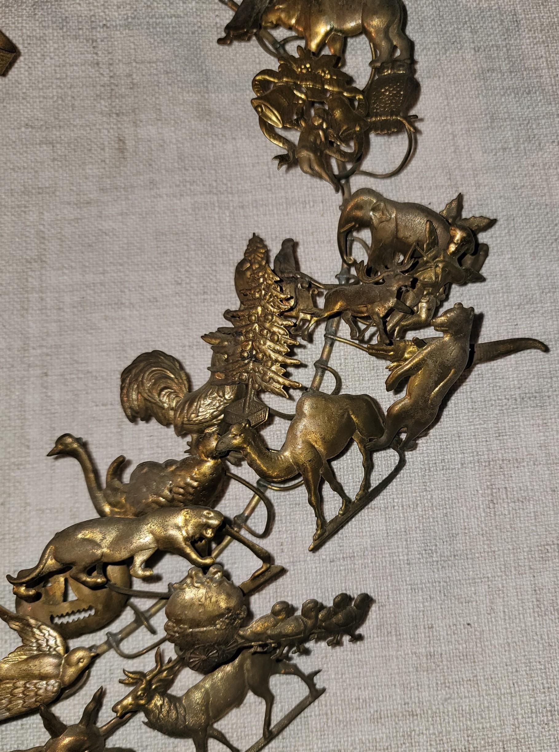 The Dresden wreath was originally made out of old candy molds or ornaments in Germany beginning in the late 1800's. The brass figurines represent seasons and holidays throughout the year, making it a piece you can keep up year round. The wreath has