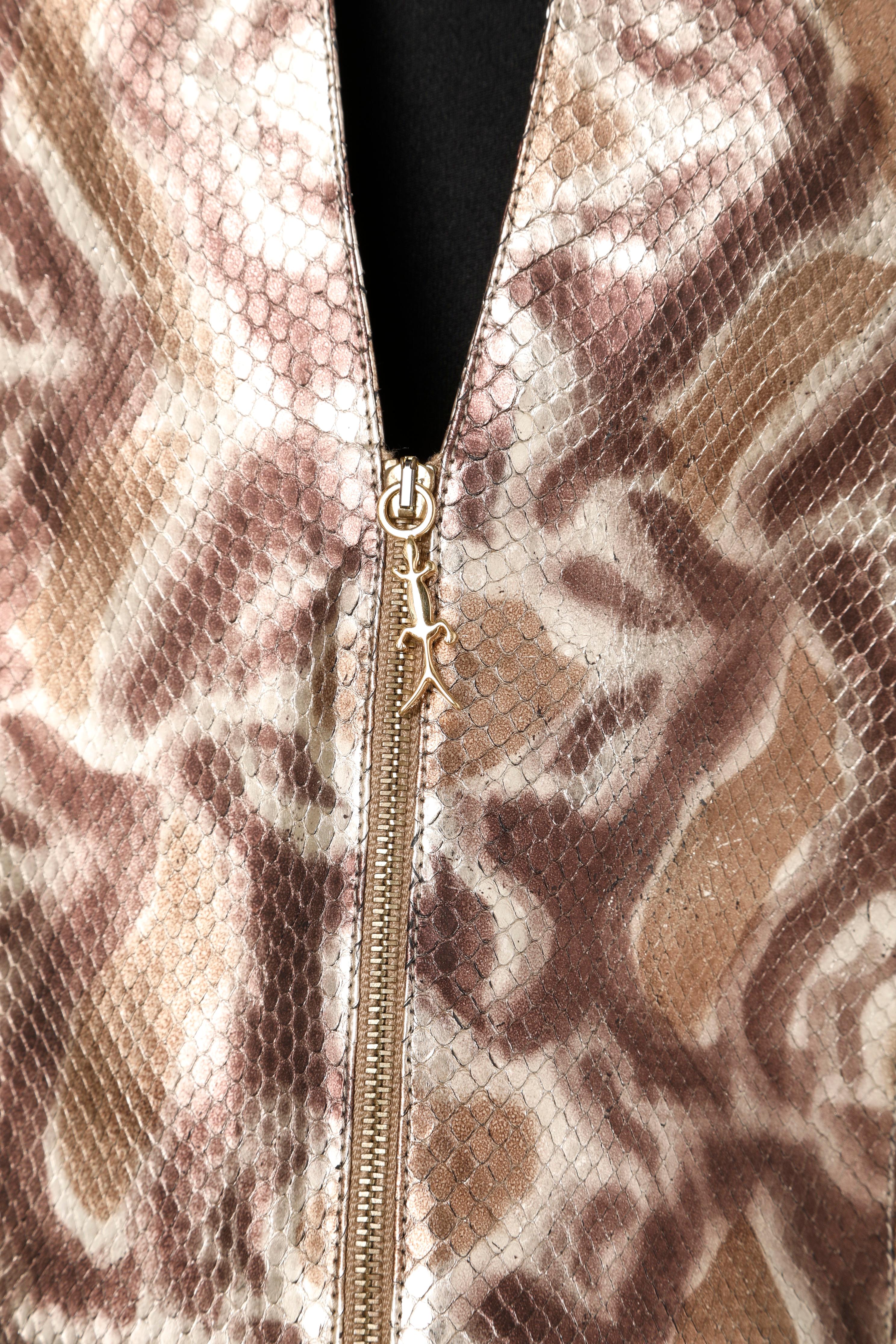 Dress Coat t in animal print python in shades of brown Shiro
back width 40cm
Size 38 French 
All real leather 
specialist leather cleaning only 
This garment is made from top quality skins. Every single skin has been hand treated. According to