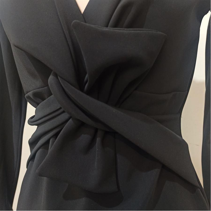 La petite robe di Chiara Boni Polyamid and Elasthane Black color Long sleeve Central bow Maximum length cm 95 (374 inches) Shoulder cm 42 (165 inches) Fabric tag missing
