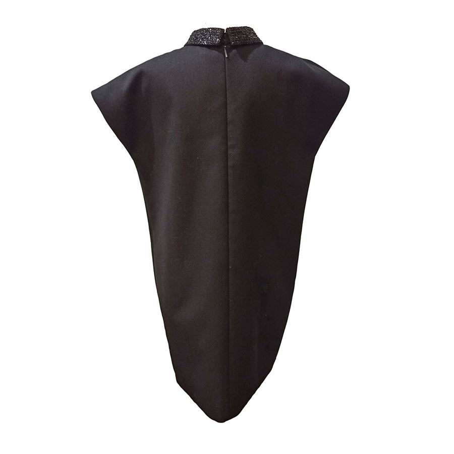 Wool Black color Sleeveless Overfit Sequins insert around the neck Maximum length cm 88 (3464 inches) Original price euro 1290
