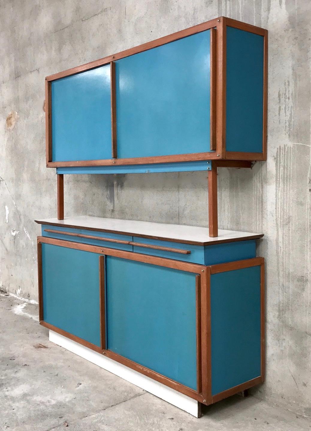Dresser buffet André Sornay, 1950s
very beautiful original condition, original blue paint.
Structure mahogany sipo screws brass typical of this production. Furniture with a Japanese and cubist spirit, in the same spirit as the creations of