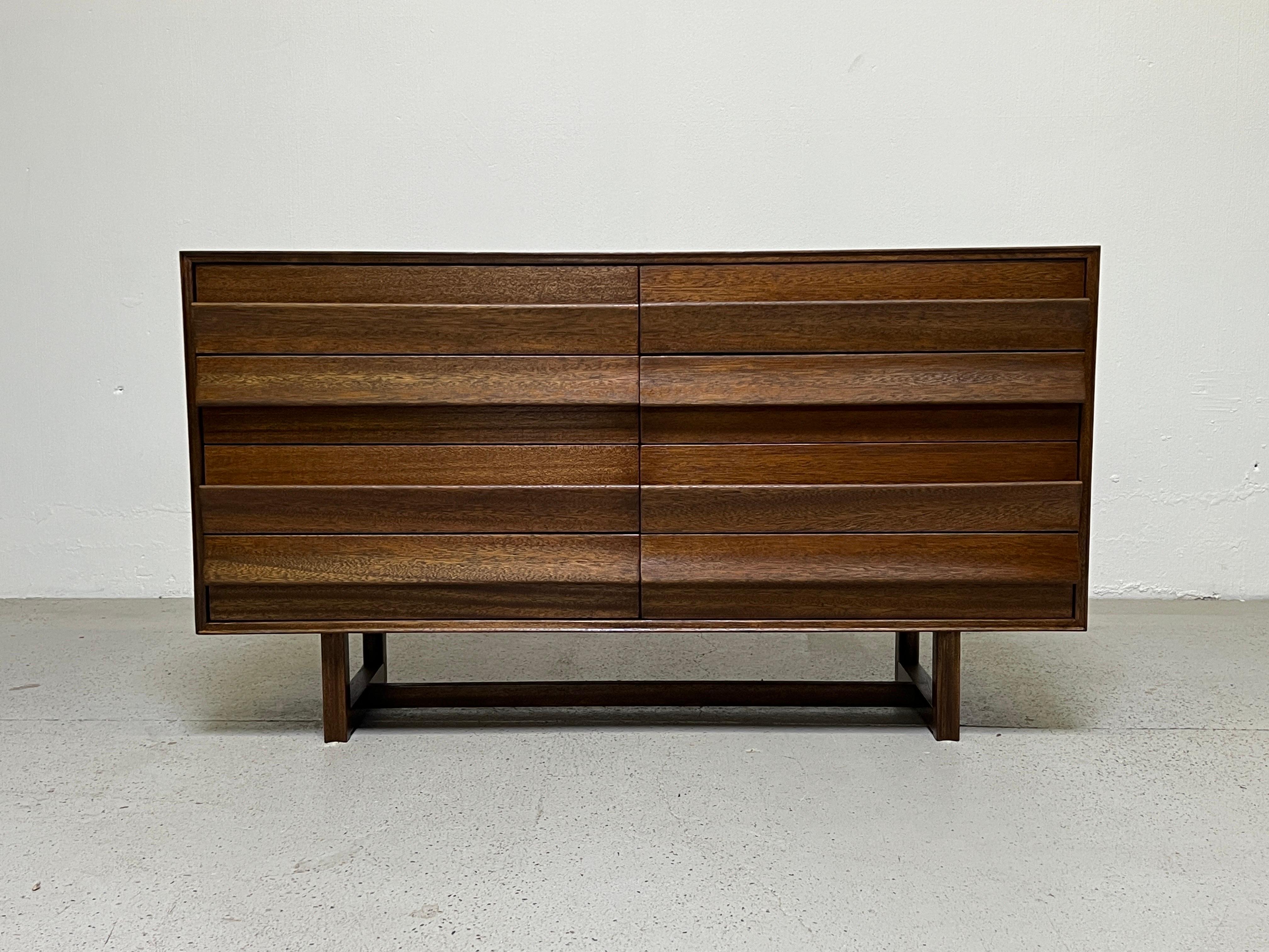 A mahogany chest of drawers designed by Paul Laszlo for brown saltman.