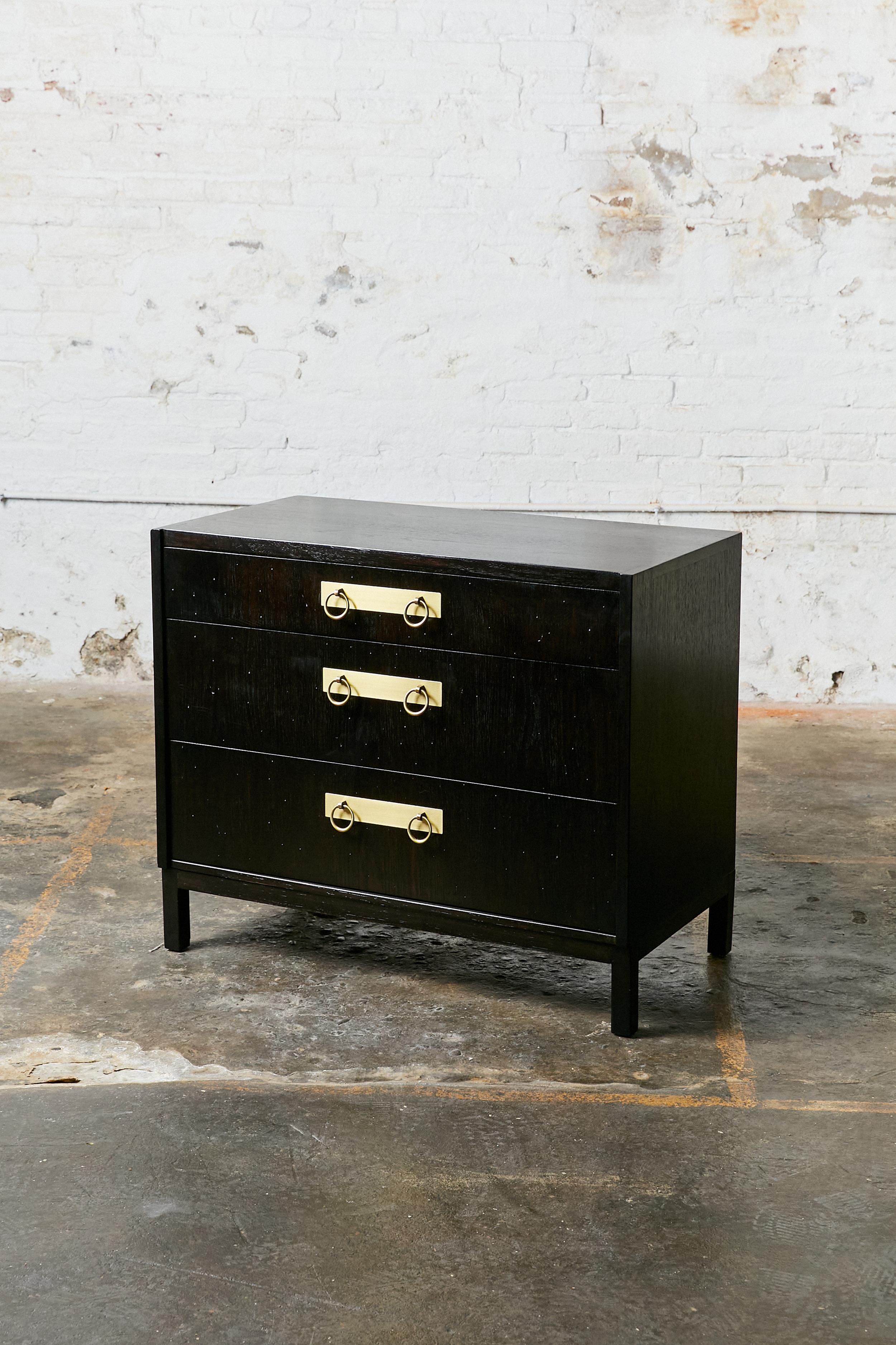 Drexel modernist three drawer dresser chest. Walnut cabinet with pull rings sitting on a brass plates. Fully re-finished. All drawers come with removable lining covered in faux suede.
