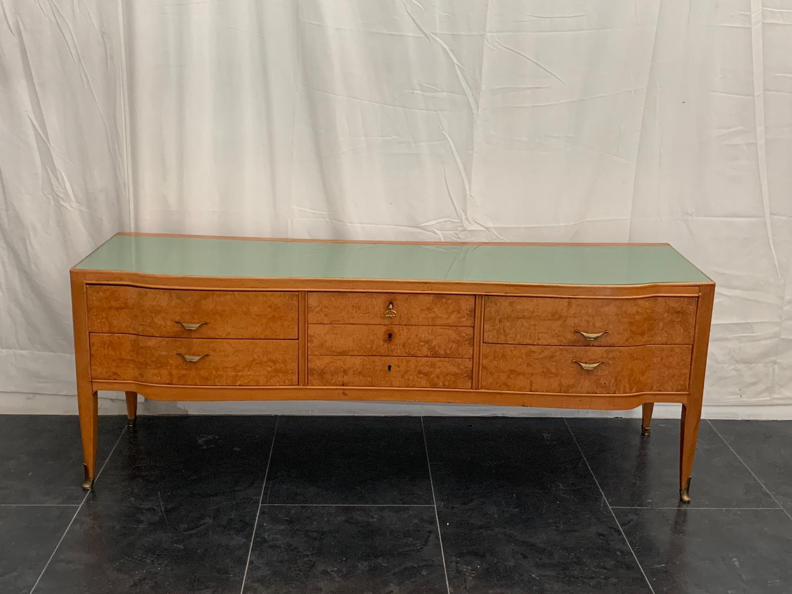 Set of maple and myrtle briar dressers and nightstands. Brass tips and handles. Retro-treated glass top from the Gris company of Varedo. Very interesting; under the top there are marks, indications, writings and initials. Dresser measures height 66x