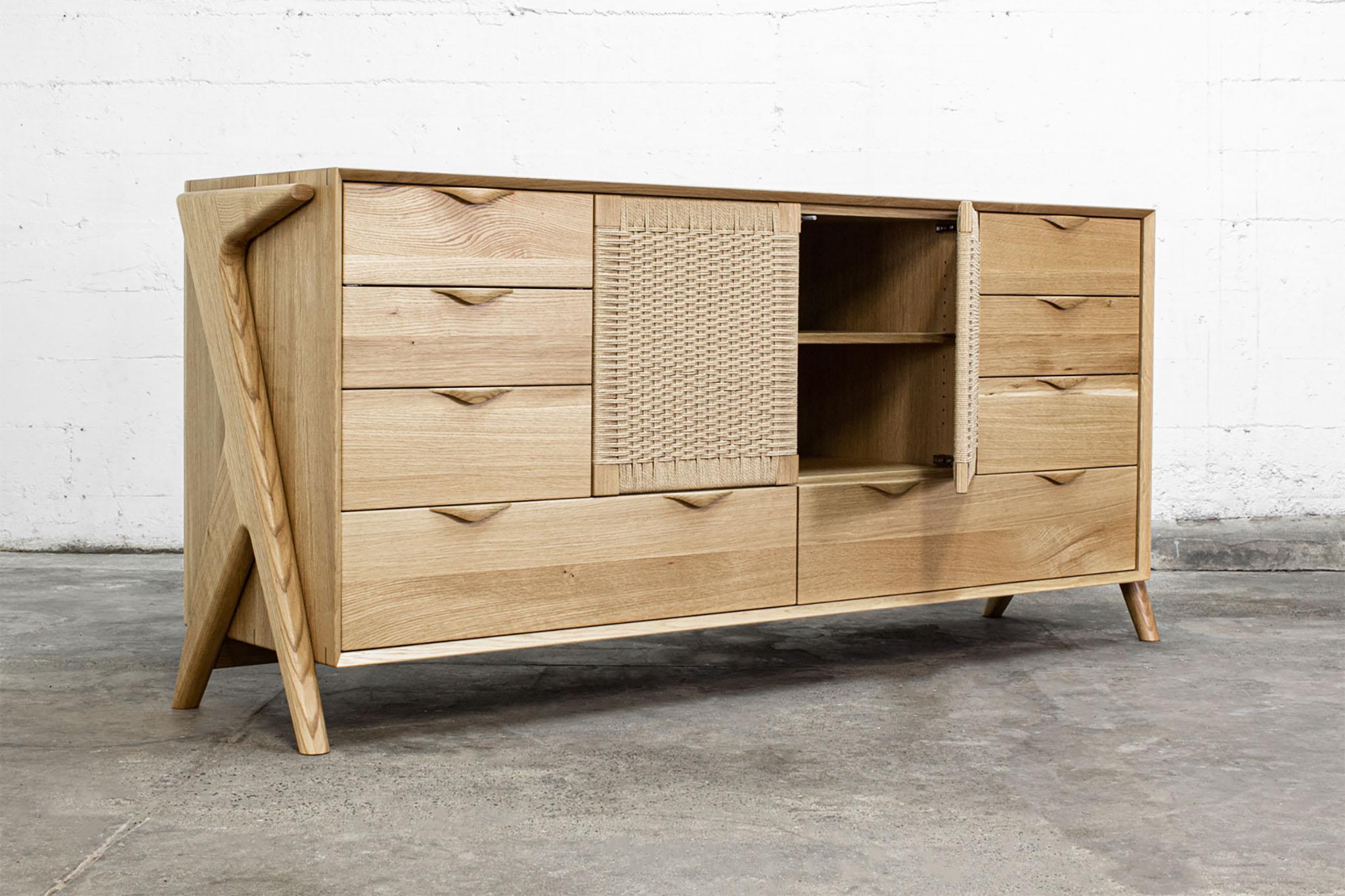 This solid hardwood 8 drawer dresser features 18