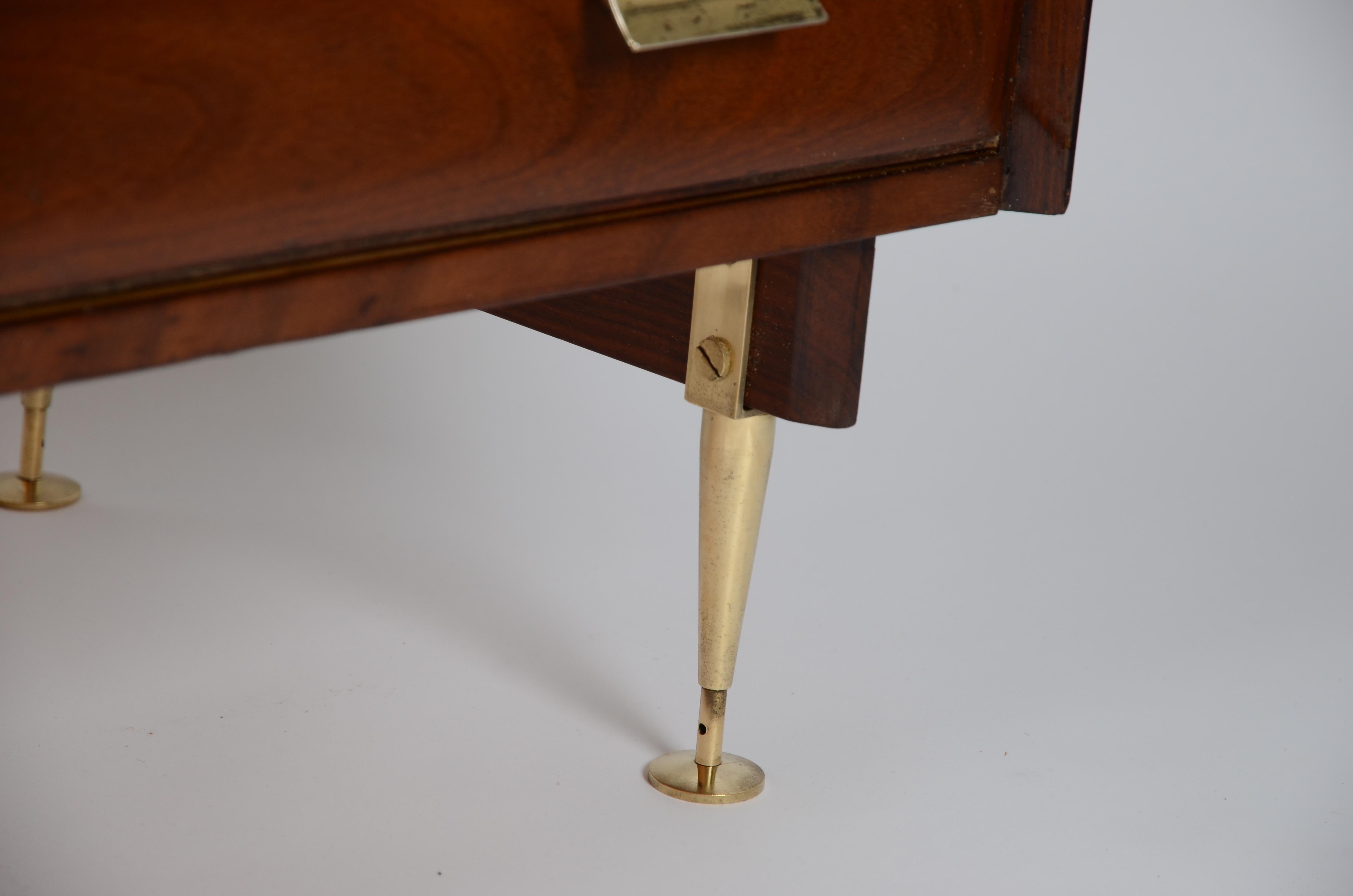 Italian dresser with decorative brass legs. Mid-1900s.