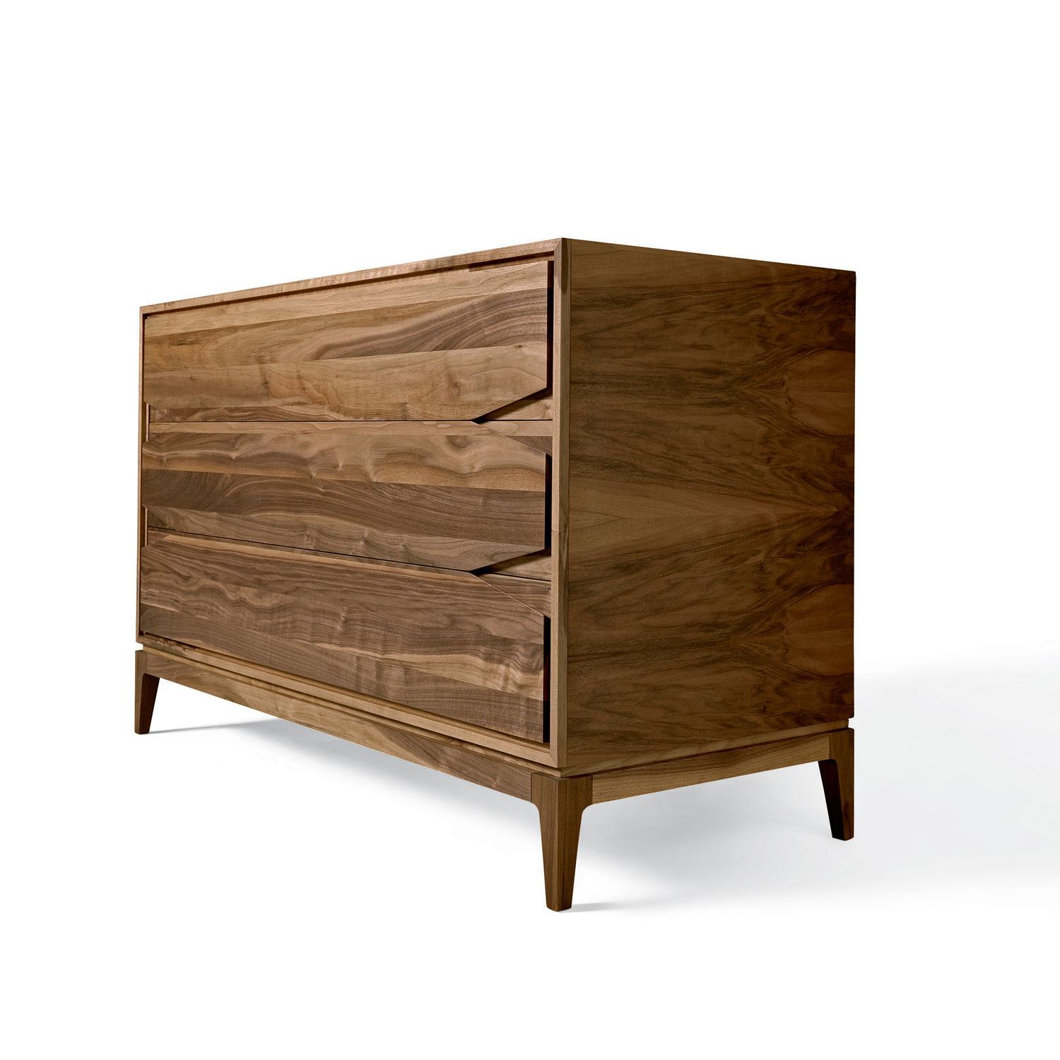 A high-end contemporary dresser crafted by expert hands in Italy with premium solid walnut, oil finish. A sturdy and durable design piece that will live thru out many generations to come. The dresser comes with three drawers with the internal in