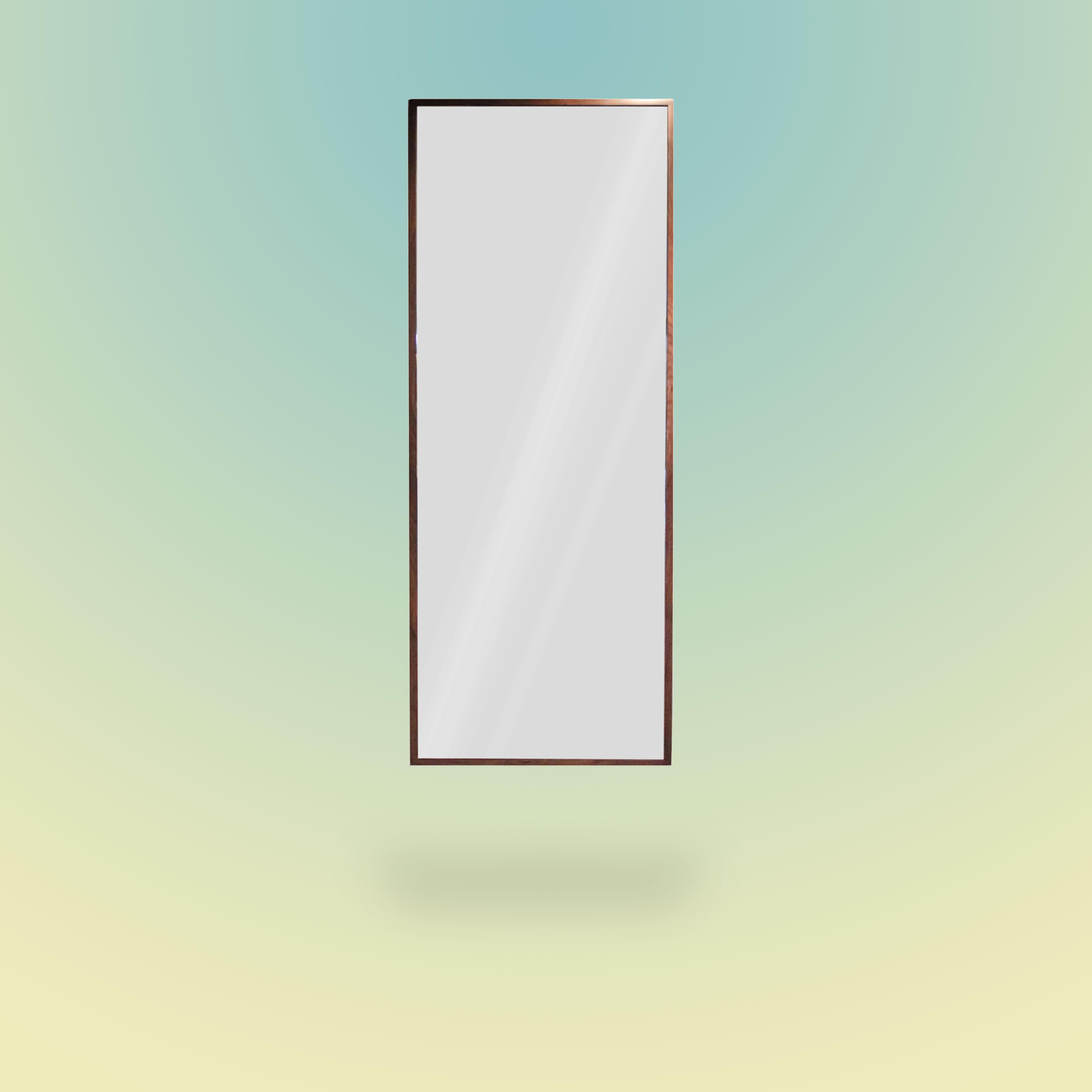 Dressing wall mirror rectangular shape. Clear mirror and walnut frame