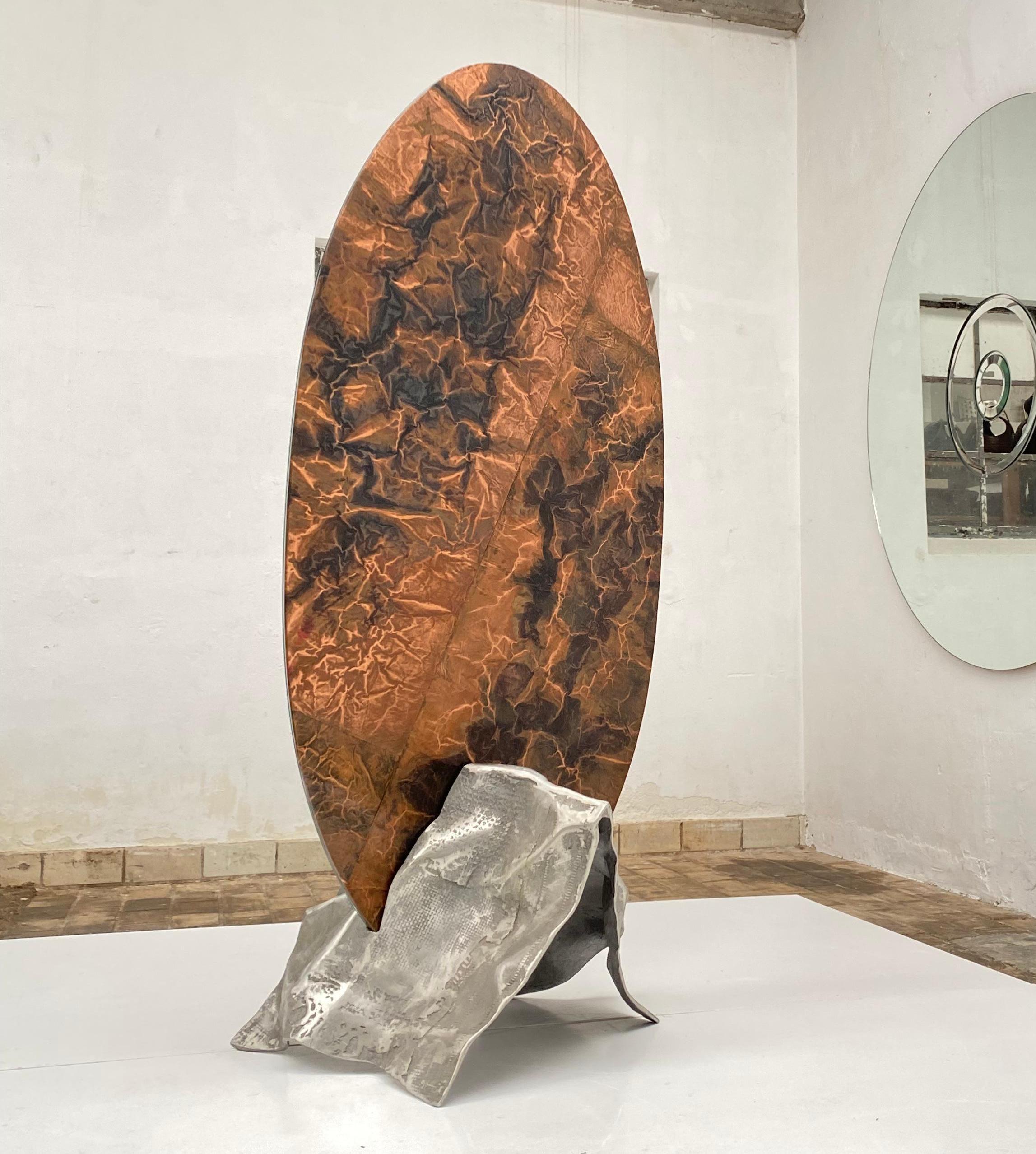 Beautiful and rare, full length elliptical form dressing mirror by italian sculptor Lorenzo Burchiellaro dating from circa 1968- 1972. The mirror element is supported on a stunning organic sculptural form created in sand cast aluminum of great