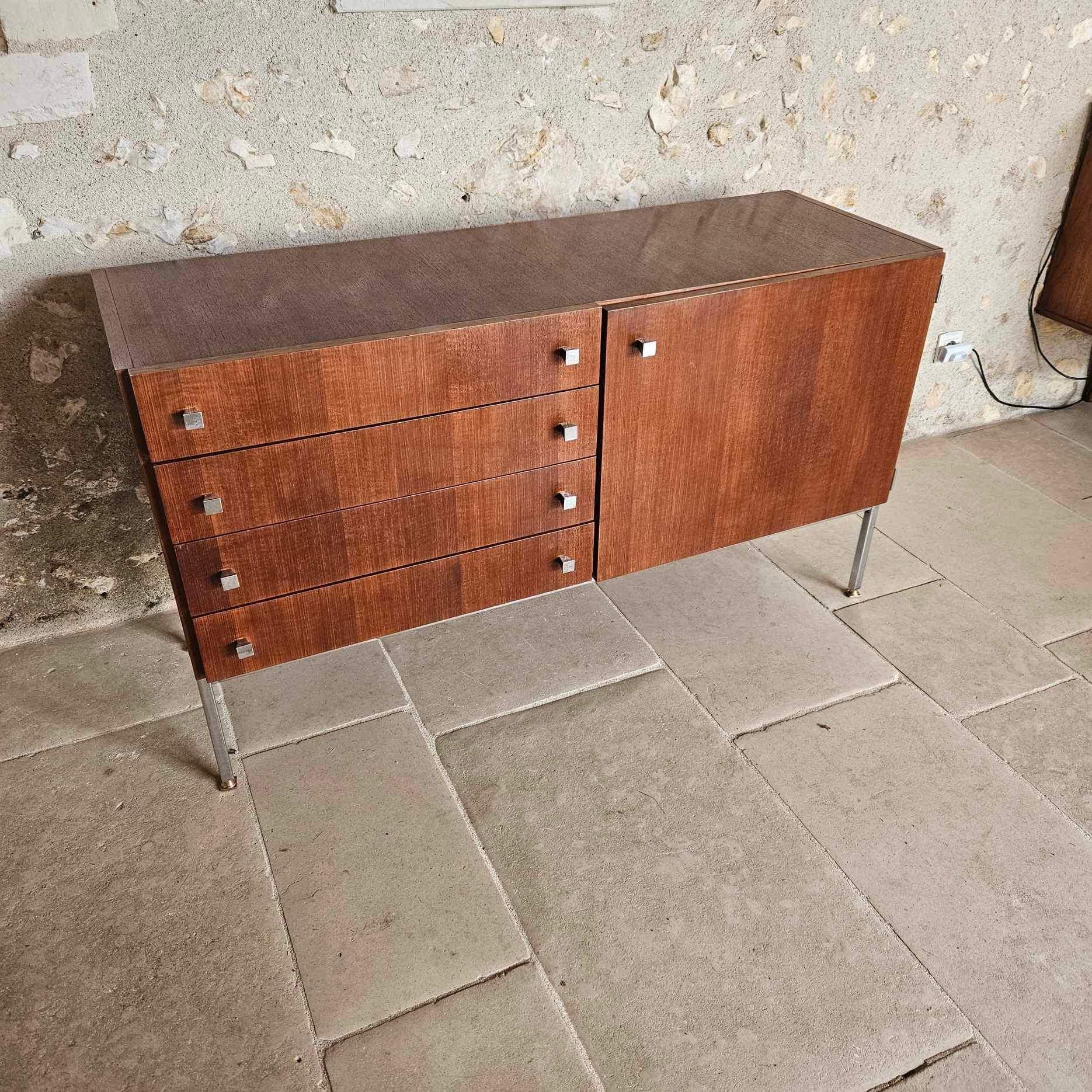 dressing table sideboard by luigi bartolini in mahogany, with 4 drawers, one of which contains a mirror and storage (the mirror can be removed) 
and the other side a cupboard with a shelf in the middle 
the feet are in chrome steel and brass