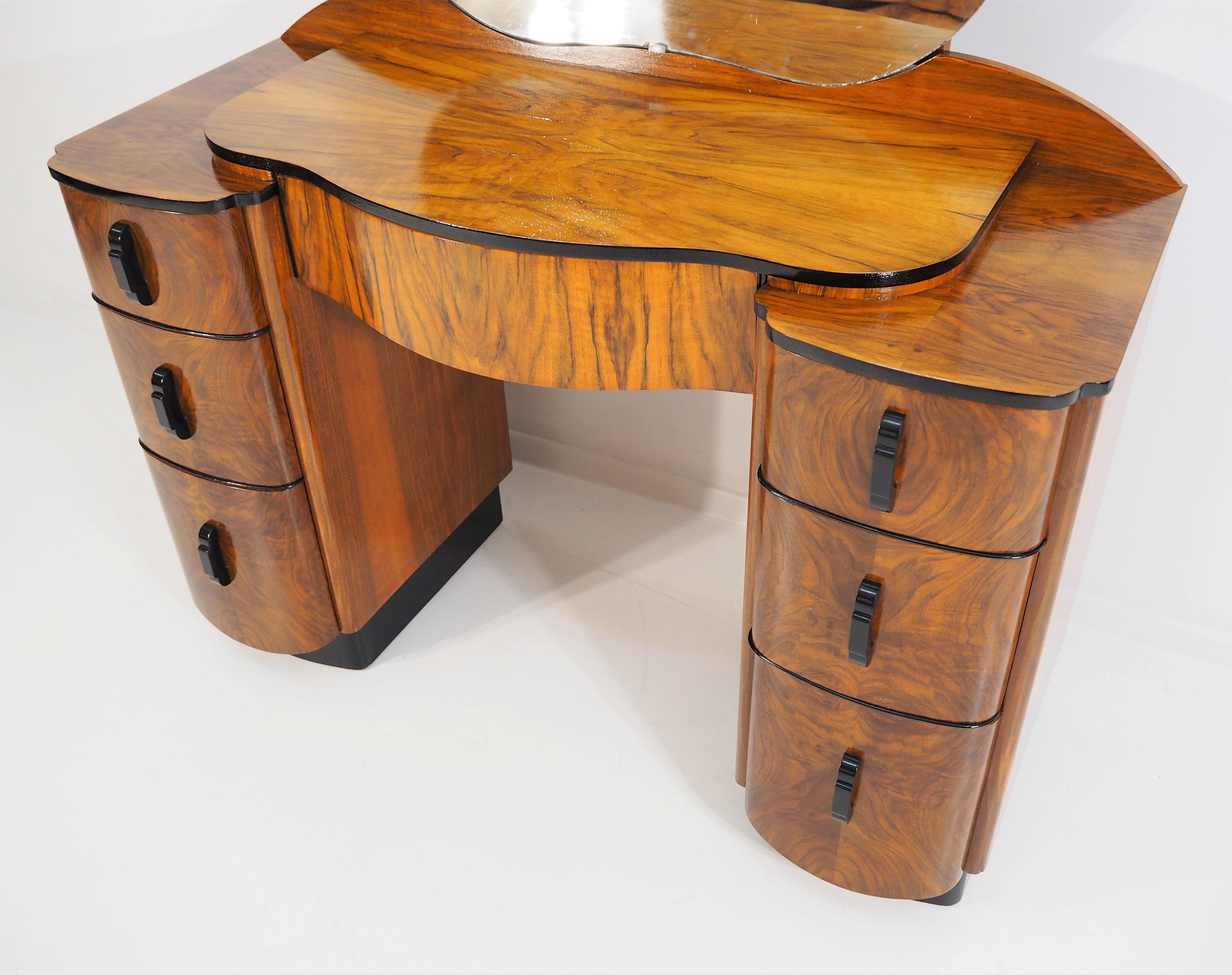 This unique furniture is made Czechoslovakia according the design J. Halabala. Beautiful design.
 