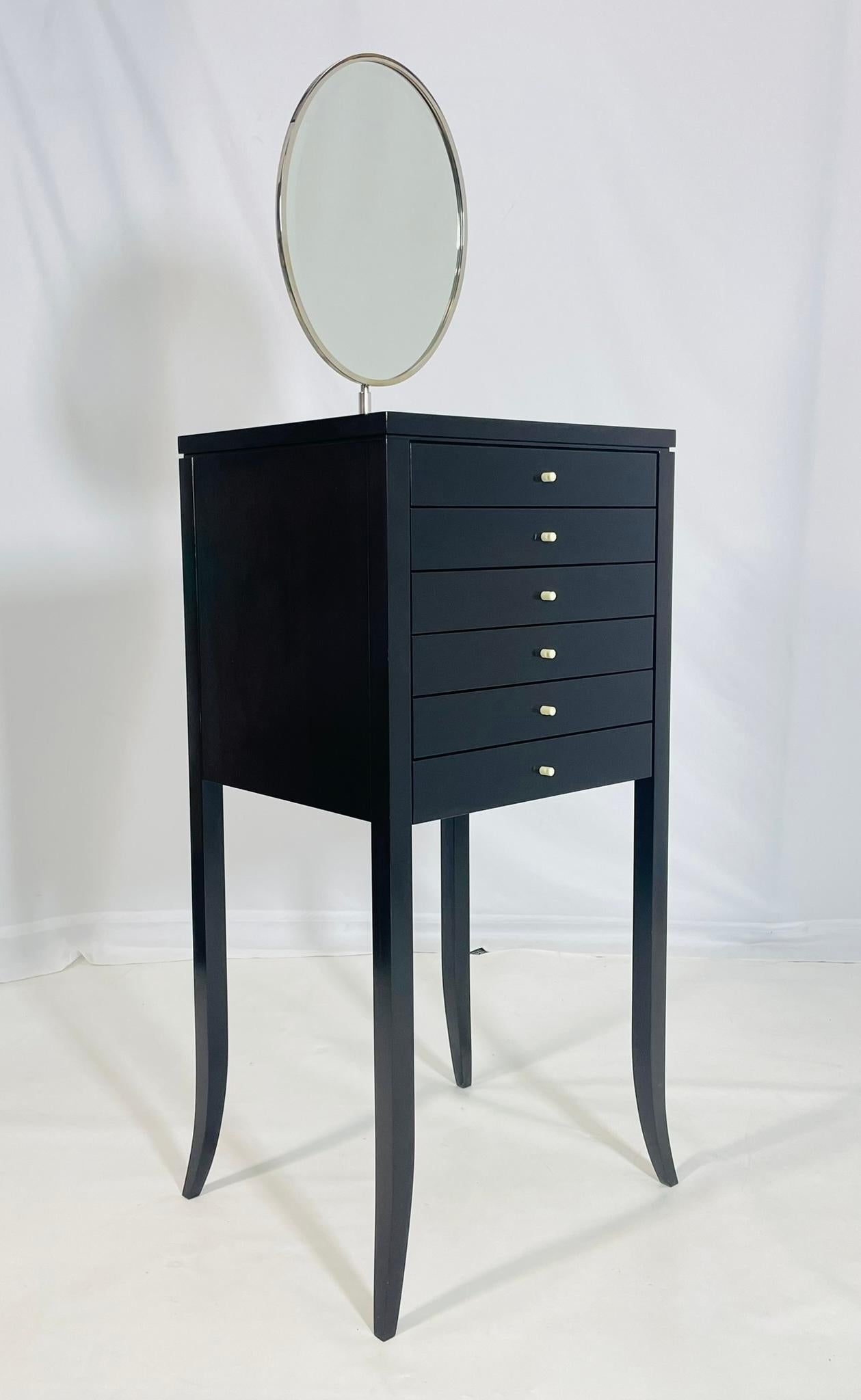 Introducing the Dressing Vanity Cabinet With Mirror by Maxine Snider Inc. USA 2023, the perfect addition to your bedroom or dressing area. 
The piece is made in a combination of solid and veneer woods with a dark espresso finish.
The cabinet