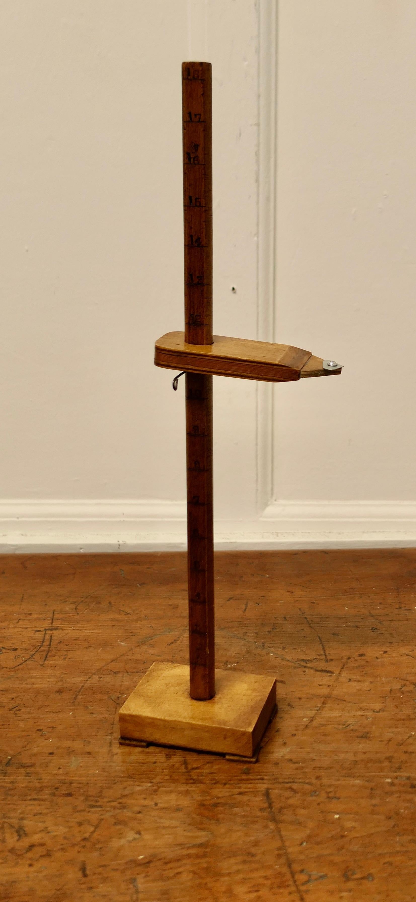Dressmaker’s Hem Height Skirt Marker

Beech Skirt Marker for measuring the height of a skirt from the floor up . This would have been used in a shop to make alterations to the length of the dress
The marker is made in beech it is 19” tall with 1”