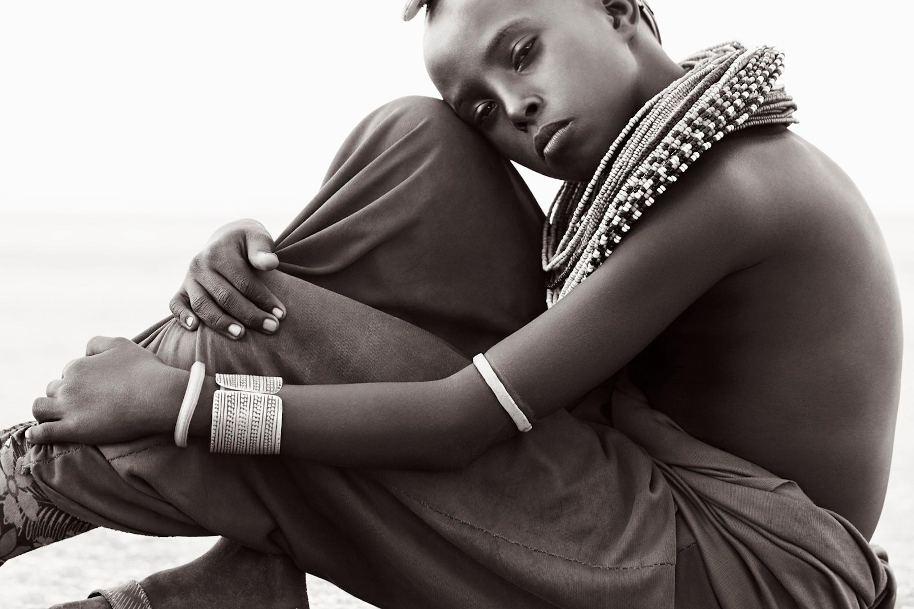 1stdibs Images 1stdibs Images 100% 10 R158  Young Rendille woman relaxing on th - Photograph by Drew Doggett