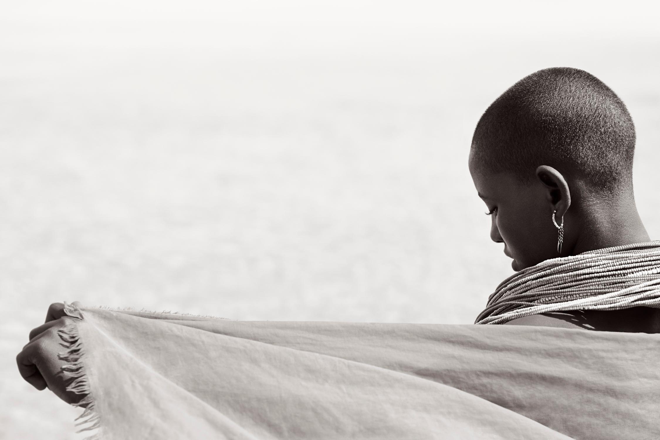 Drew Doggett Black and White Photograph - A young woman takes a moment to herself in the desert landscape she calls home