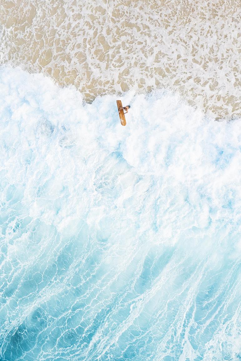 Drew Doggett Color Photograph - Bestseller, Aerial, Hawaii, Surfer Approaching the Ocean