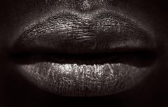 Bold, detailed portrait of the lips of a Suri woman in Ethiopia
