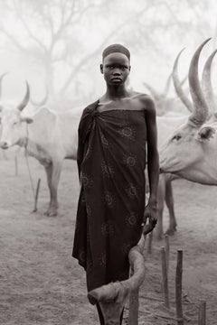 Cultural Portrait of a Young Boy in South Sudan Amidst the Mundari Cattle Camps