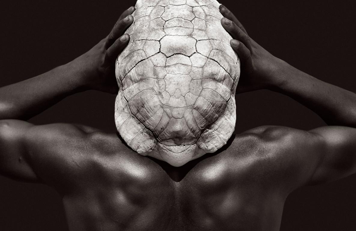 Drew Doggett Black and White Photograph - Karo Man with a Tortoise Shell, Ethiopia, Fashion, Iconic