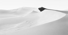 Light on the sand dunes in Sossusvlei, Namibia, with one mysterious pocket of sh