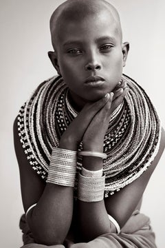 Portrait of a Young Woman Wearing Traditional Tribal Jewelry, Africa, Fashion