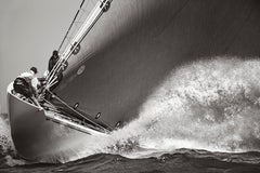 The incredible moment in this photograph features the yacht Ranger at high speed