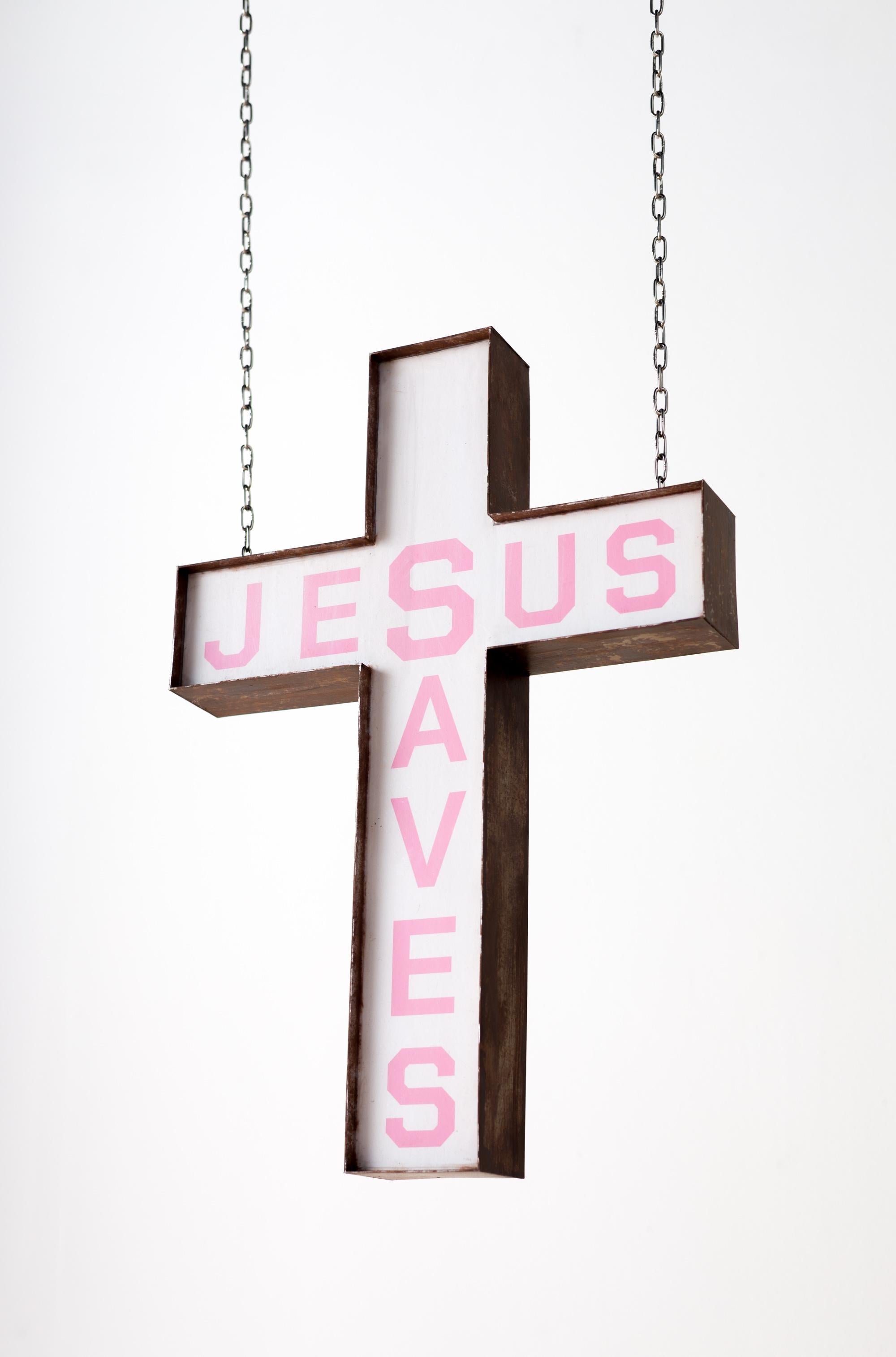 This piece titled "Jesus Saves" is original artwork made from paper, inkjet print, enamel, wire, chain, aluminum tube, pastel by Drew Leshko. This piece measures approx. 18”h x 12.75”w x 2.25”d.

Drew Leshko is a Philadelphia, Pennsylvania-based