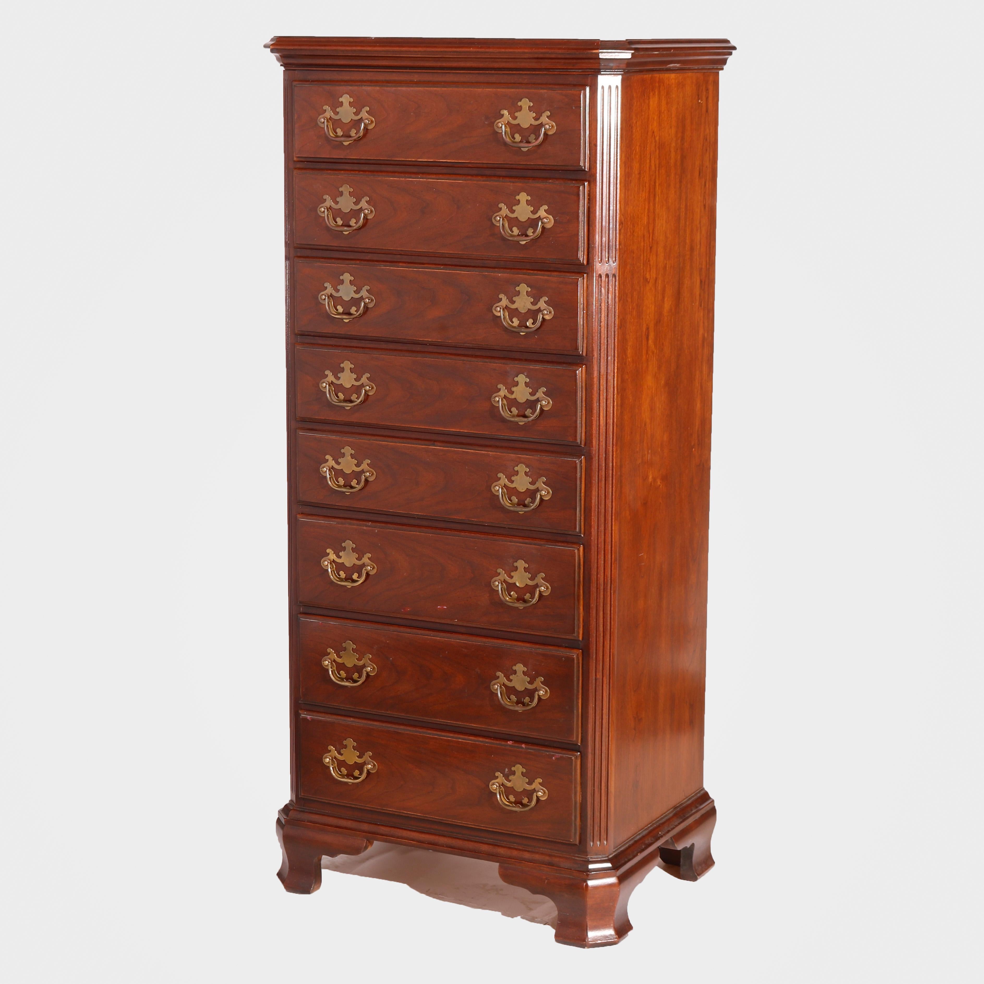 A Chippendale style lingerie chest by Drexel offers cherry construction with eight drawers having brass batwing pulls, raised on bracket feet, maker mark as photographed, 20th century.

Measures - 53.5