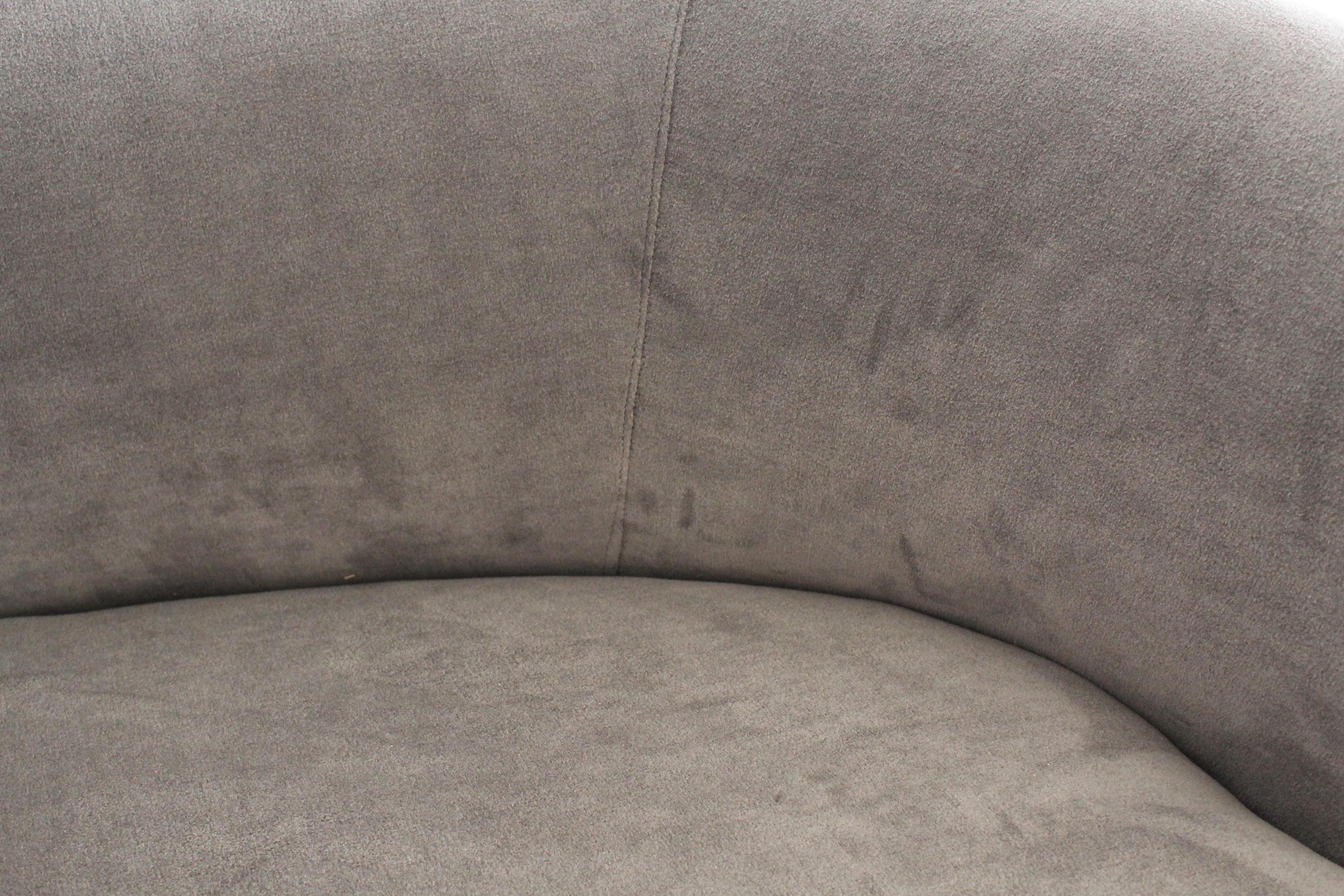 Amazing curved kidney shaped sofas recently upholstered in a lovely velvet fabric in the shade of taupe. Sofas measure 30